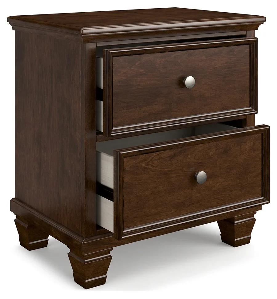 Two-drawer cherry nightstand with a brownish cherry finish, dovetail drawers, tapered feet, and satin nickel-tone hardware.