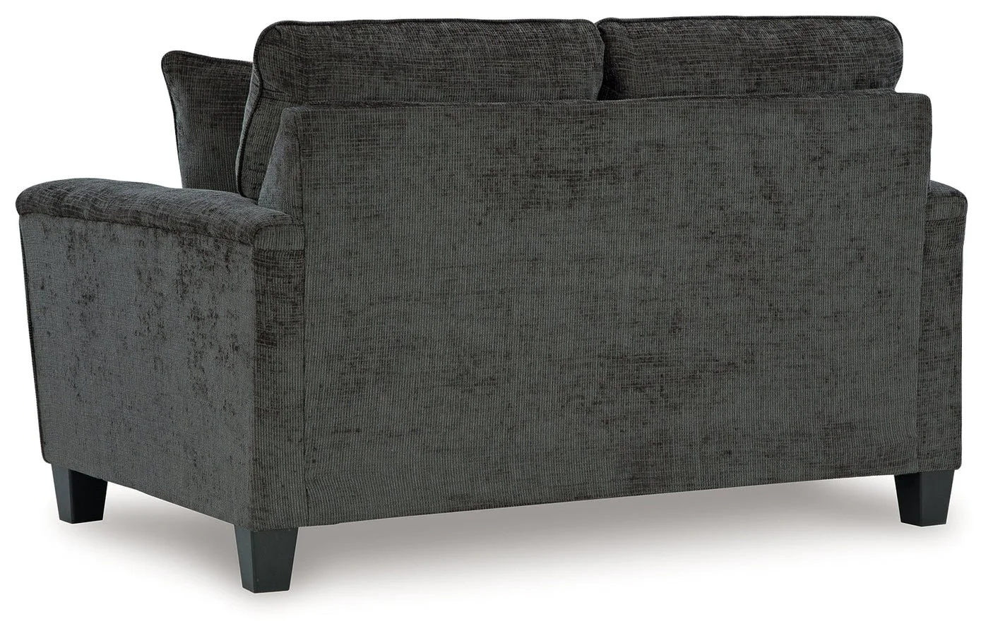 Matching contemporary loveseat with plush polyester upholstery, tapered faux wood legs, and coordinating accent pillows.