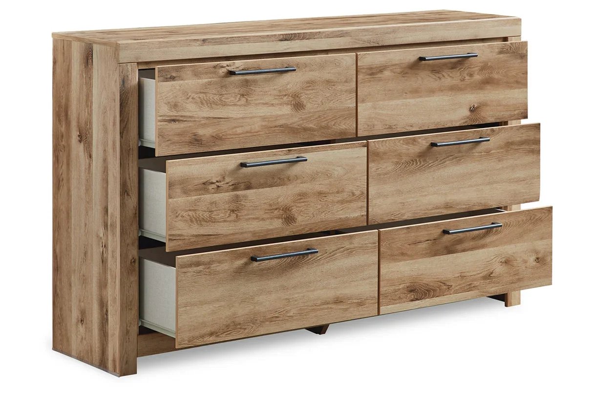 Six-drawer dresser with a matching mirror, golden rustic finish, faux linen-lined drawers, and antiqued gunmetal hardware.