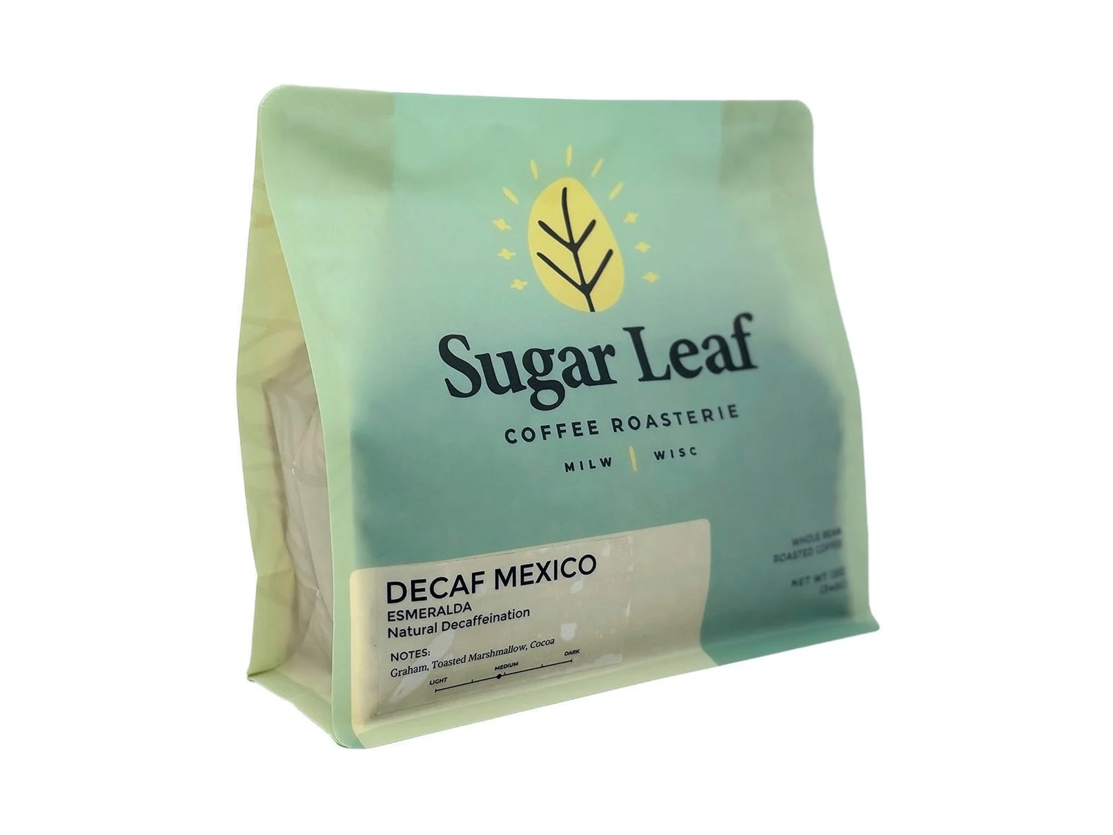 Angled view of a teal and cream 12 oz bag of Sugar Leaf Decaf Mexico Esmeralda whole bean coffee