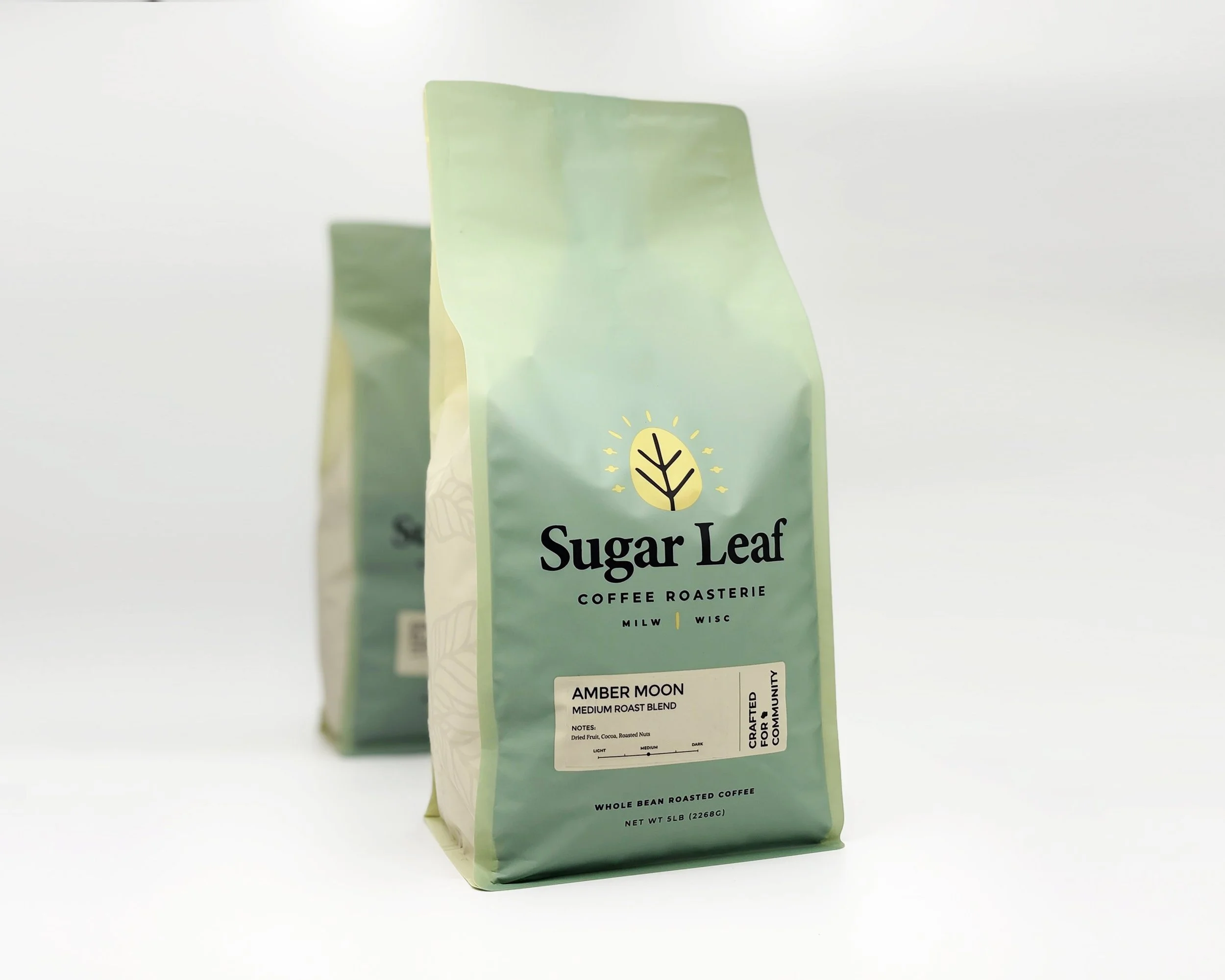 Two large bags of Sugar Leaf Amber Moon coffee