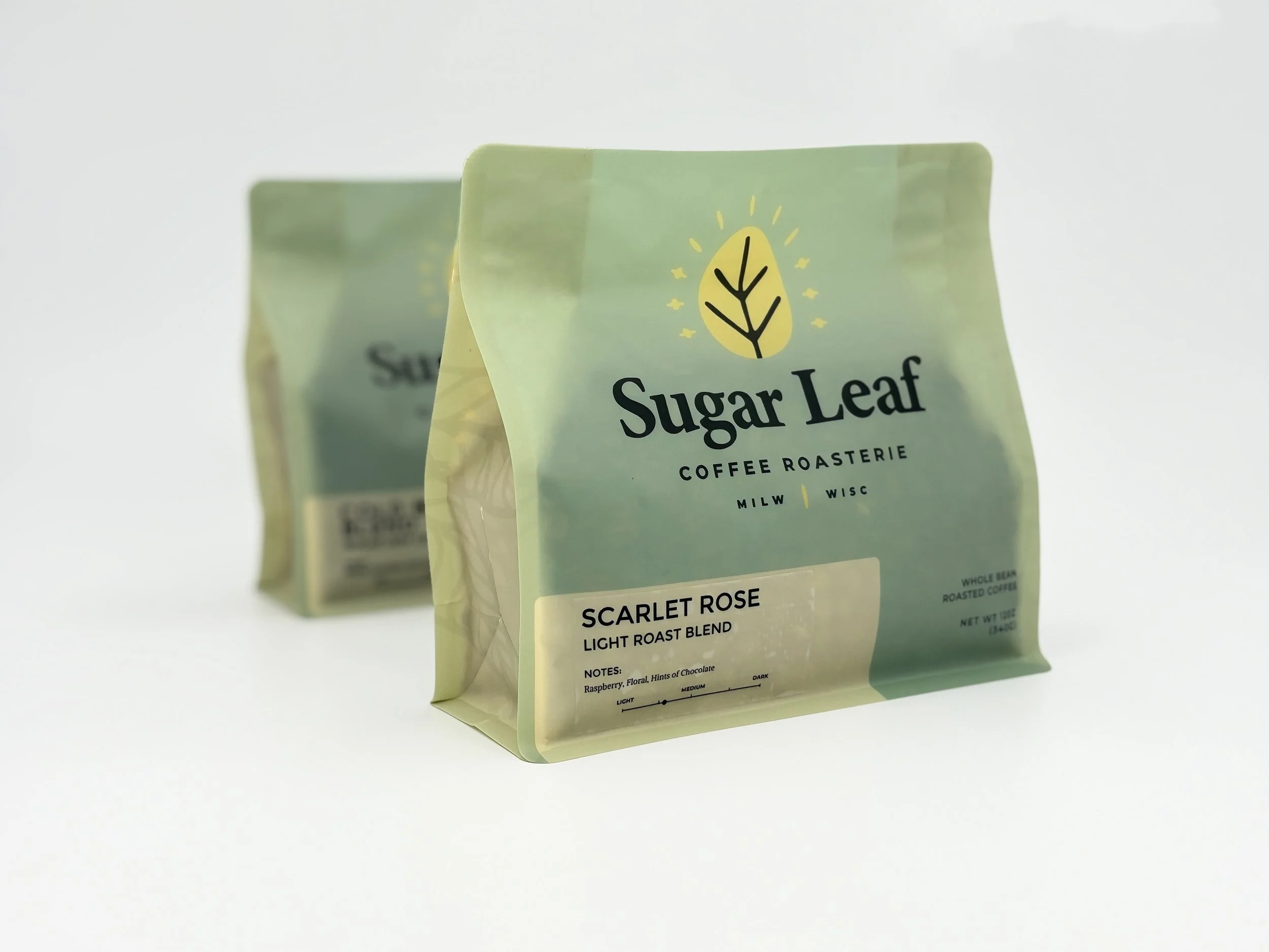 Two bags of Sugar Leaf Scarlet Rose coffee