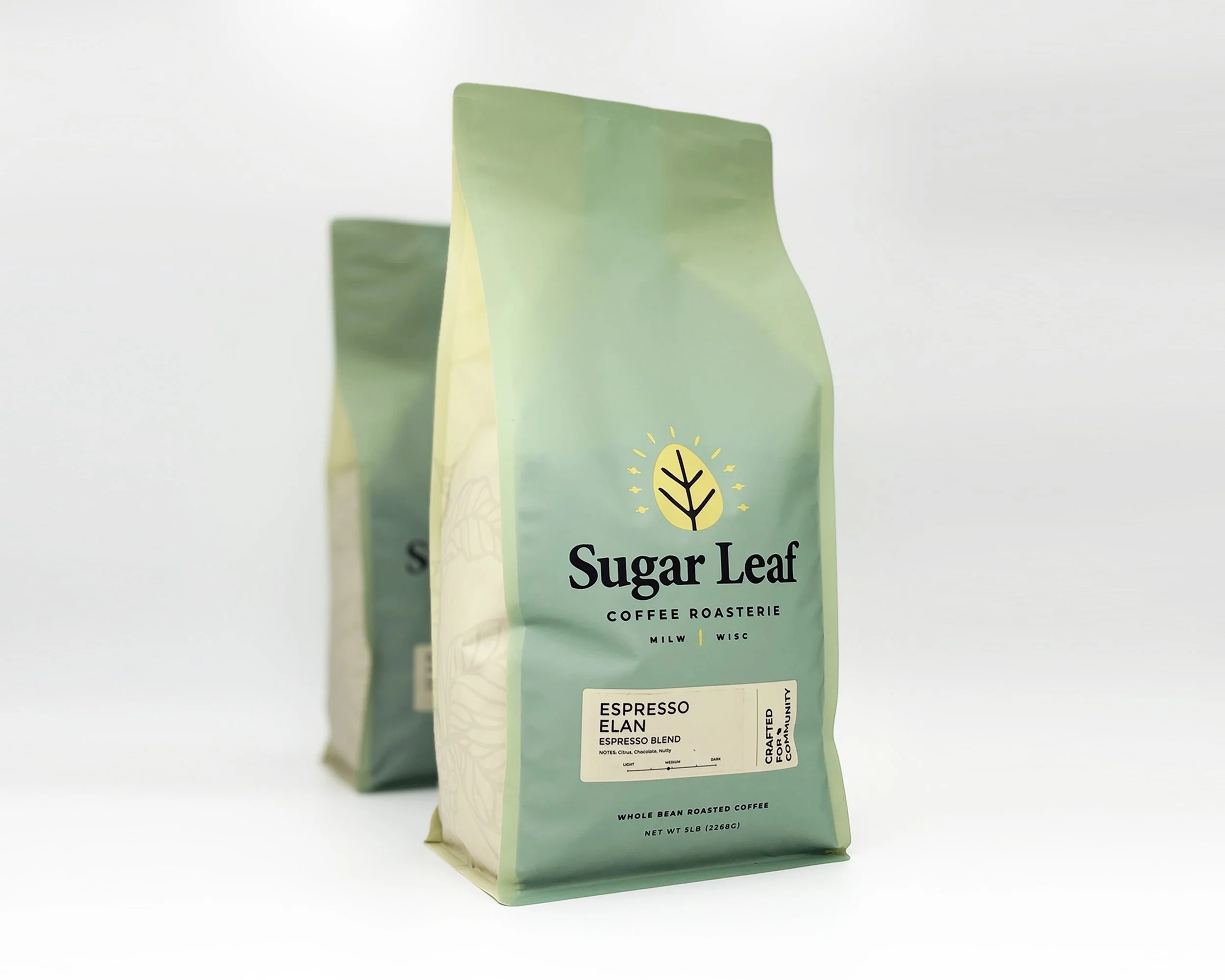 Tow large bags of Sugar Leaf Espresso Elan coffee