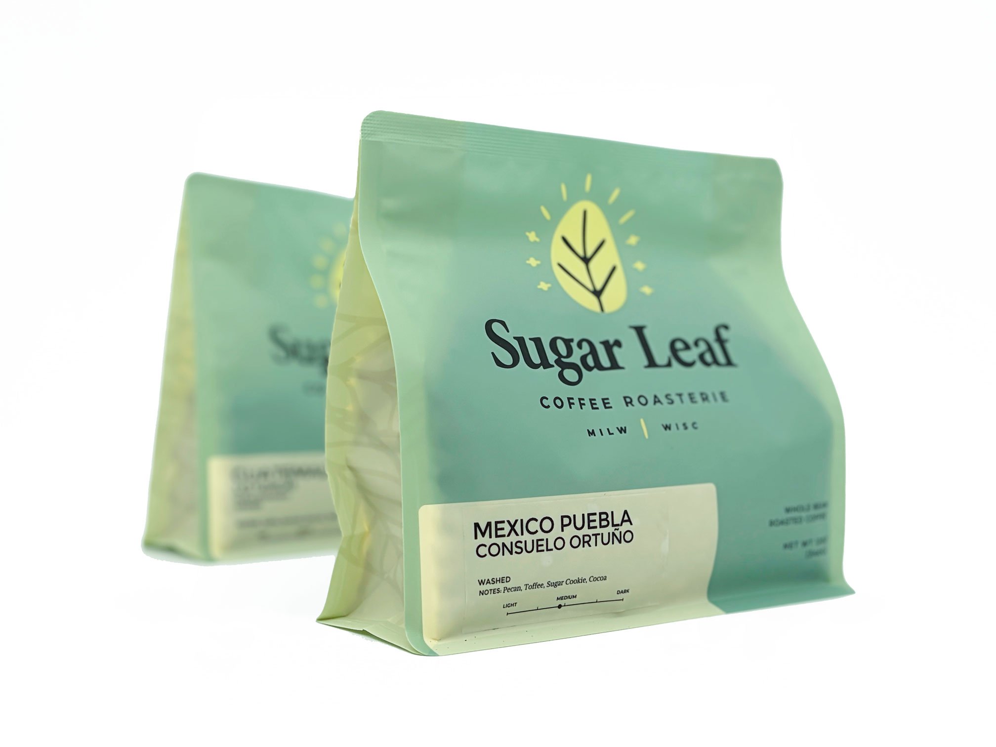 Two bags of Sugar Leaf Mexico Puebla Consuelo Ortuño single-origin coffee