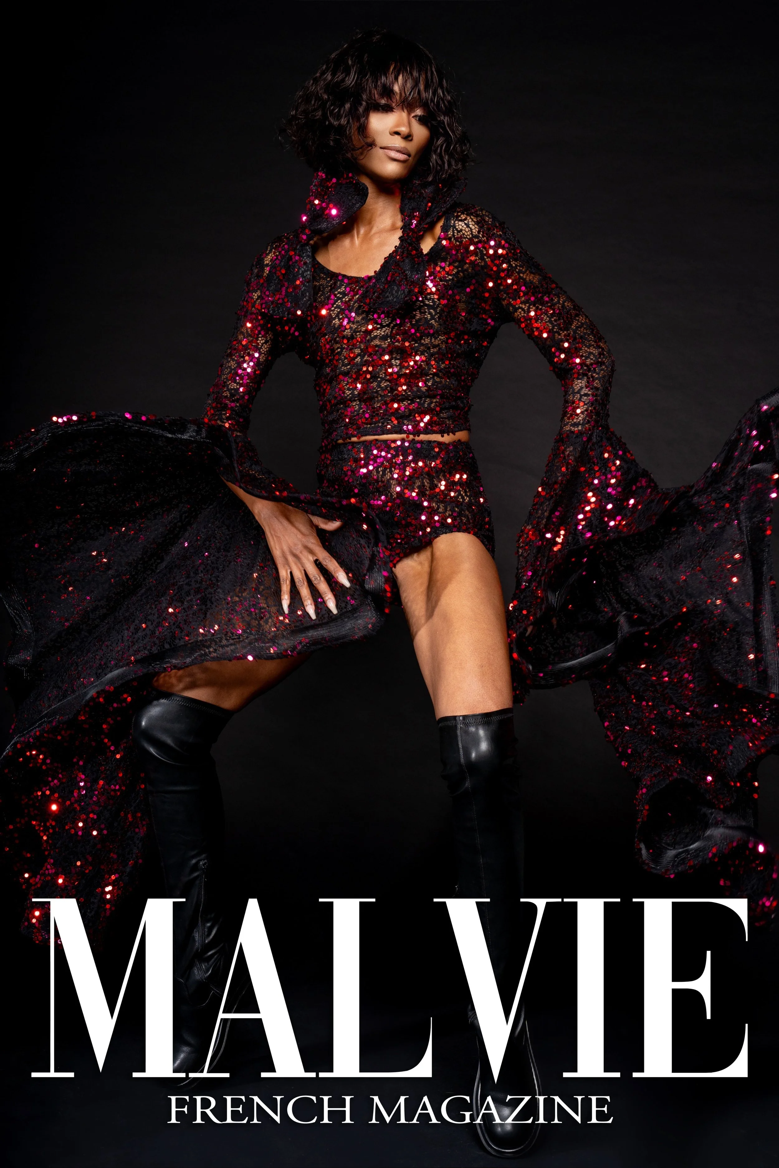 Cover of French magazine Malvie featuring a woman in a black and red sequin dress with black thigh-high boots, posing against a black background.