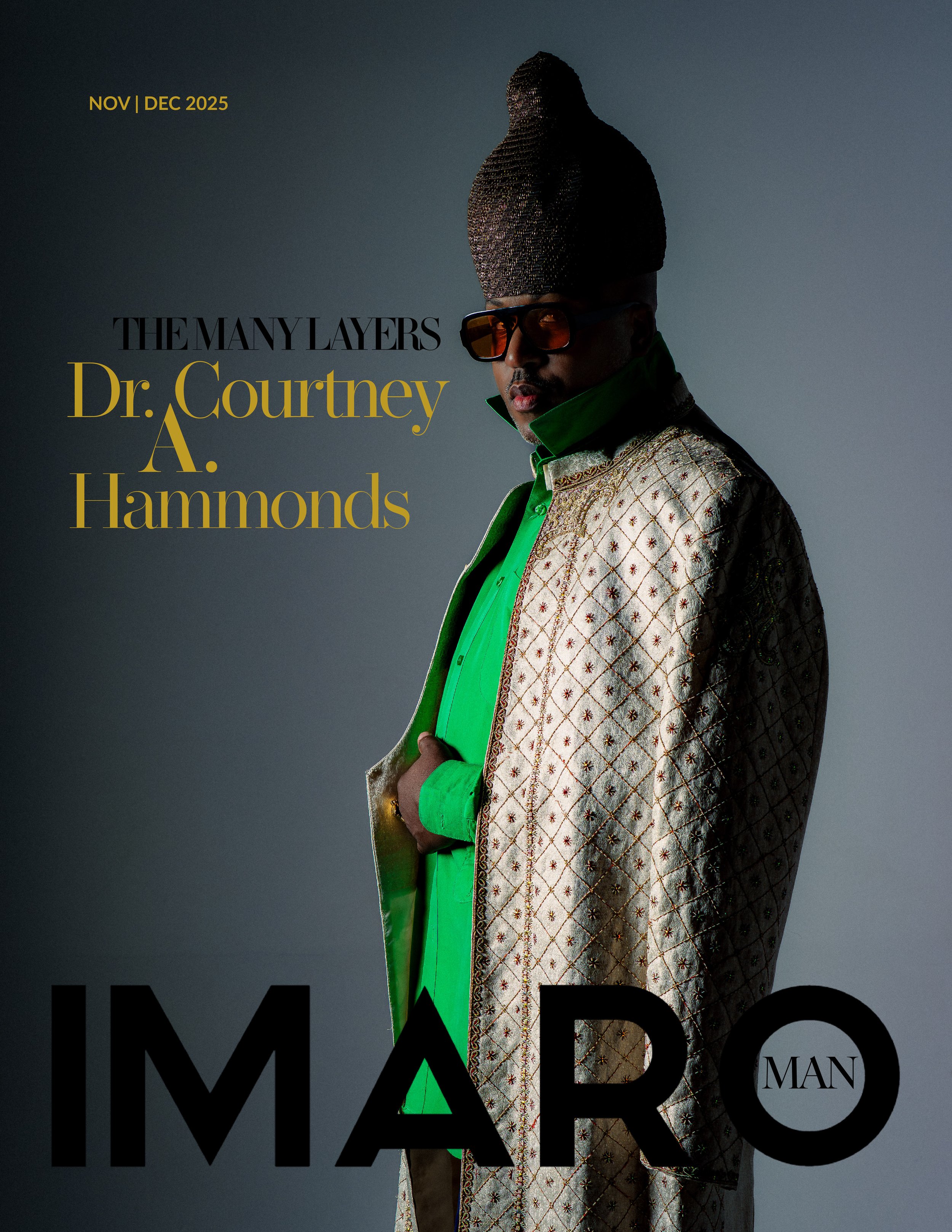 Promotional poster featuring a man wearing sunglasses and a traditional patterned coat with a tall, elaborate headpiece. The background is dark with text indicating the months November and December 2025, and the event title and performer, Dr. A. Hammond.