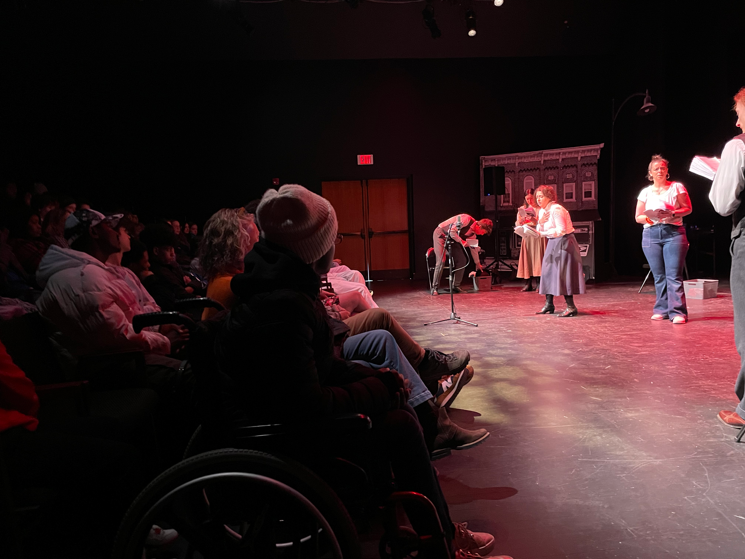 image of students watching Triangle in darkened theatre