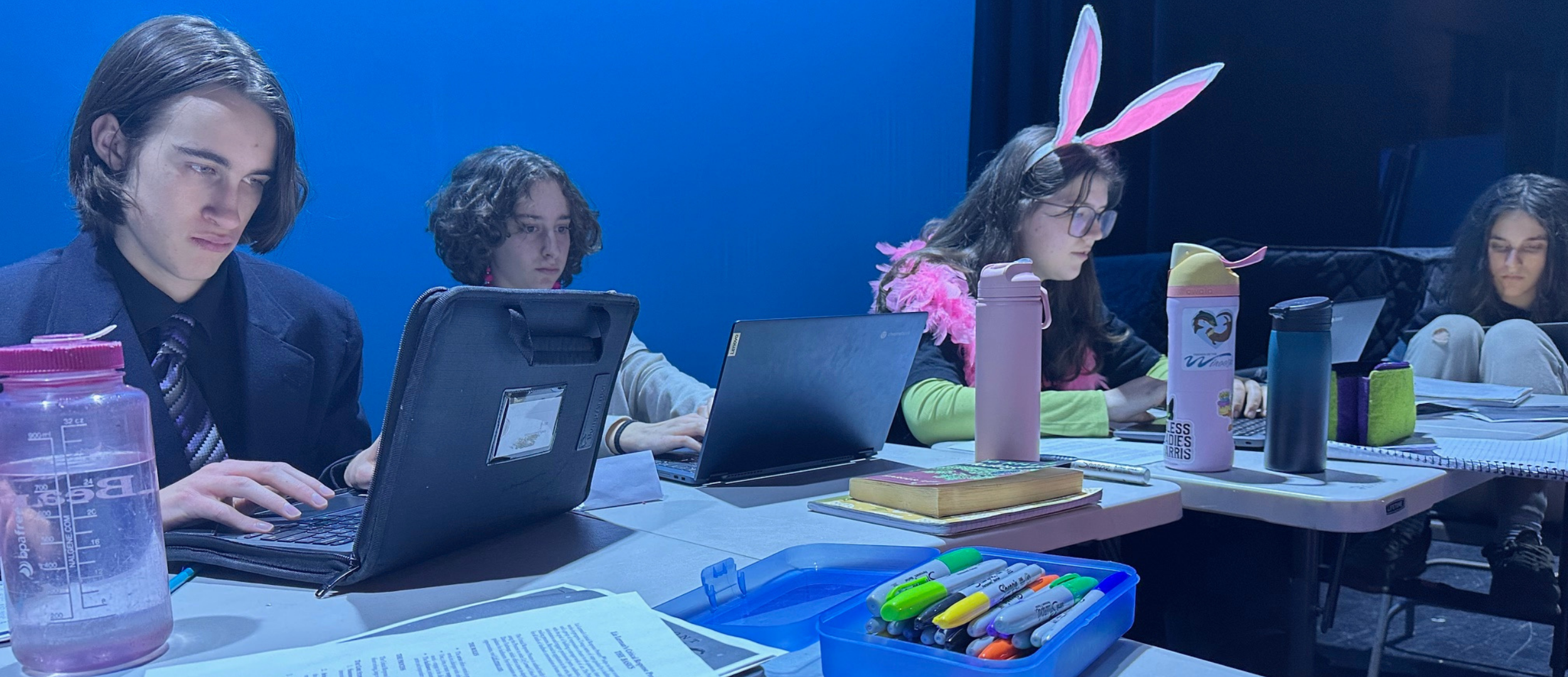 students working on their plays during an in-school workshop for Vermont Young Playwrights