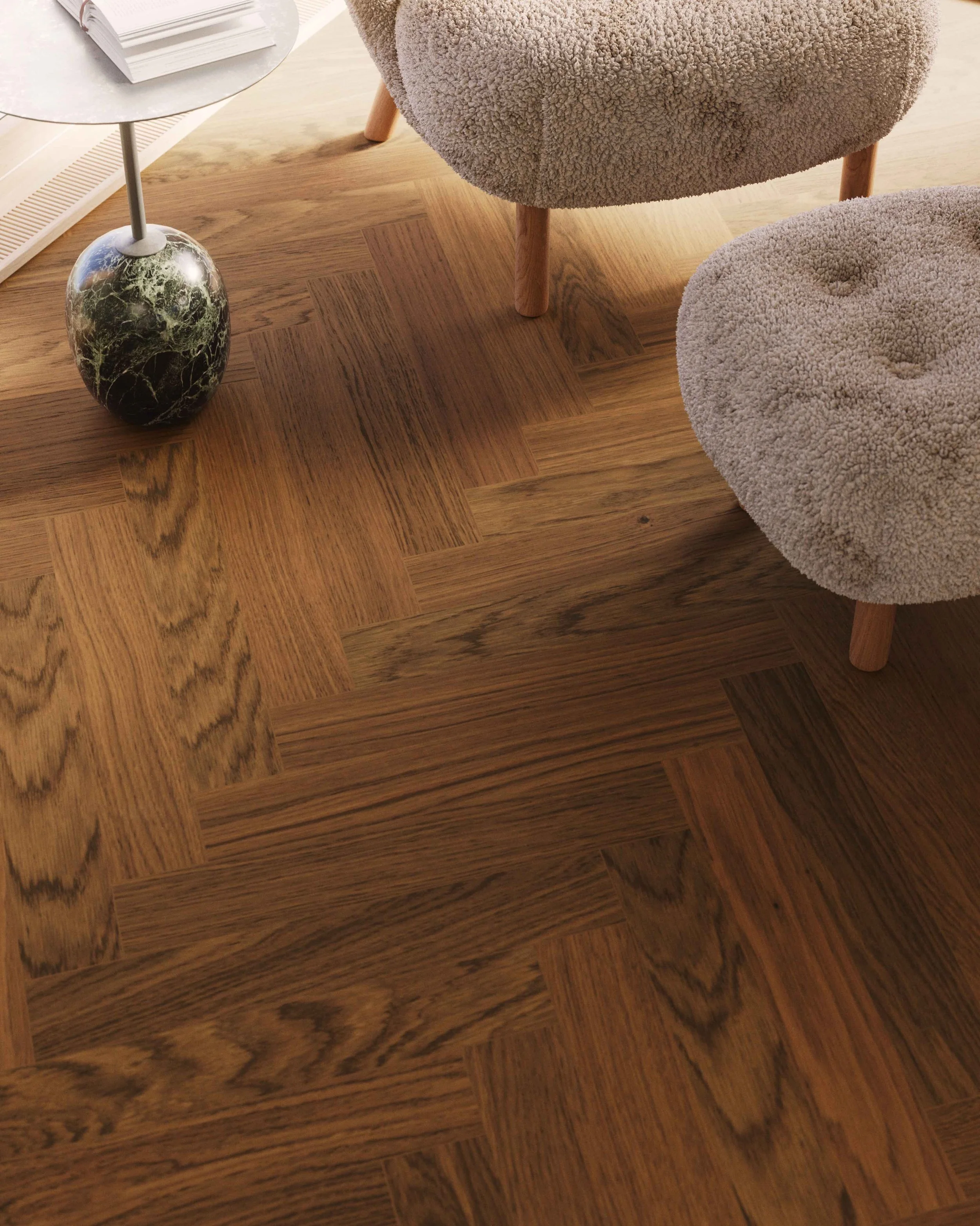 Wood flooring Installed in a herringbone pattern.  In a chiq home withe modern furniture.