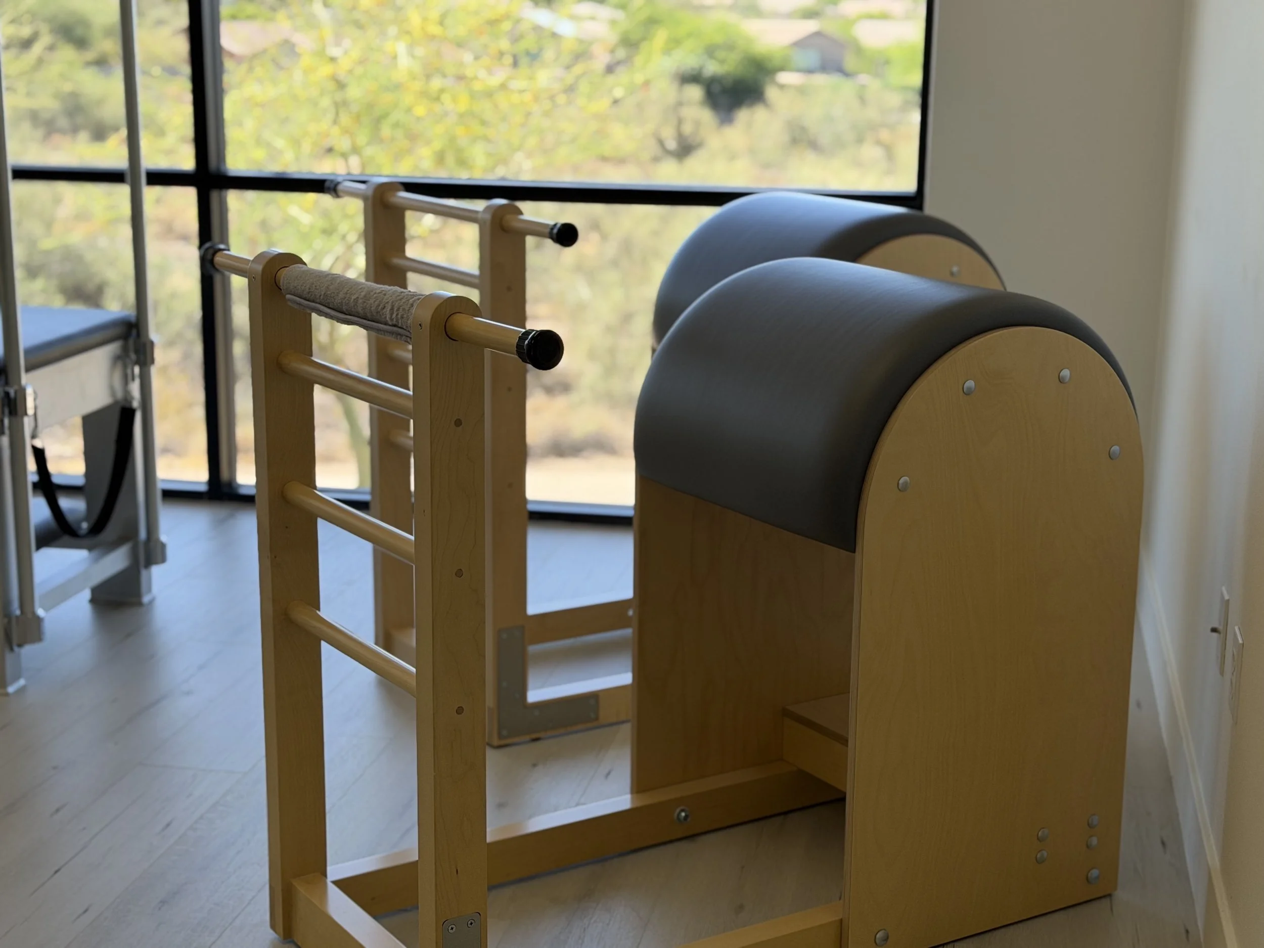 Pilates ladder barrel used for spinal mobility and controlled extension exercises