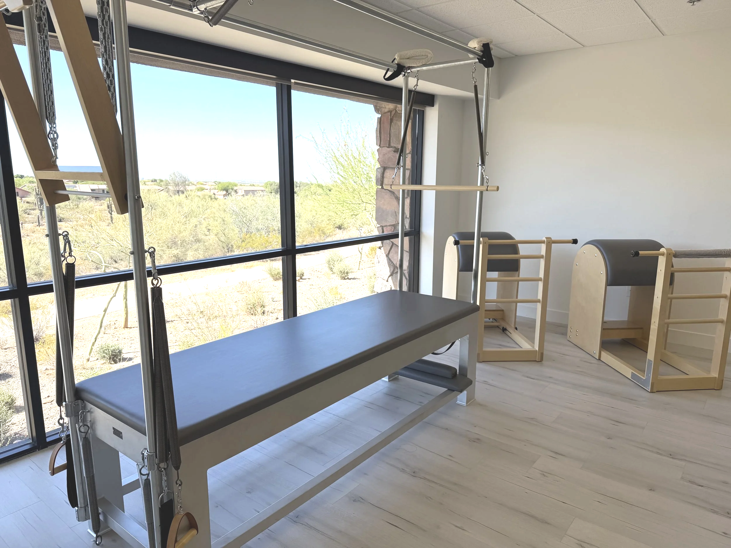 Classical Pilates Cadillac and Barrels in the TruForm Pilates Scottsdale studio.