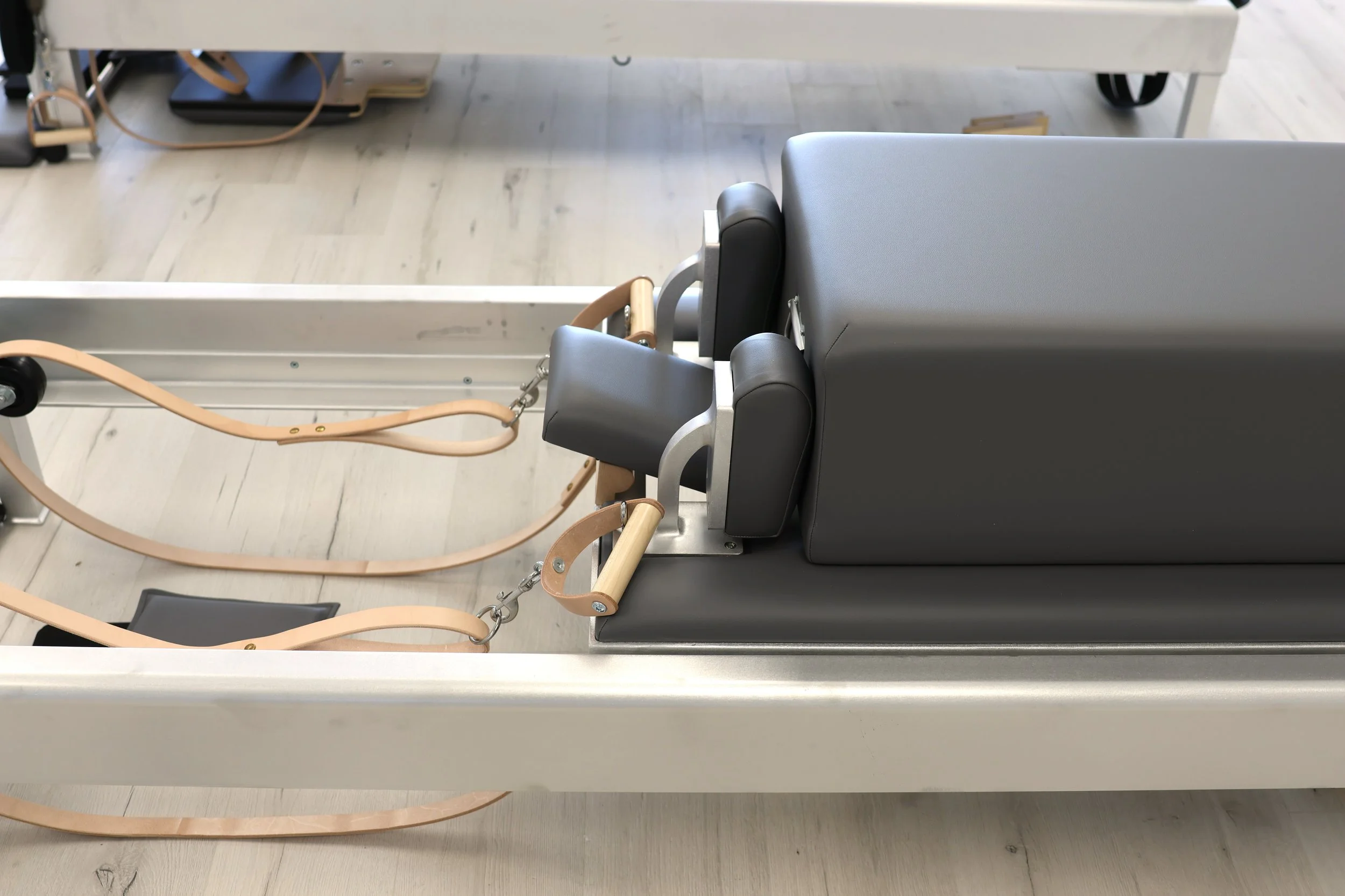 Traditional Classical Pilates Reformer with leather straps at TruForm Pilates Scottsdale