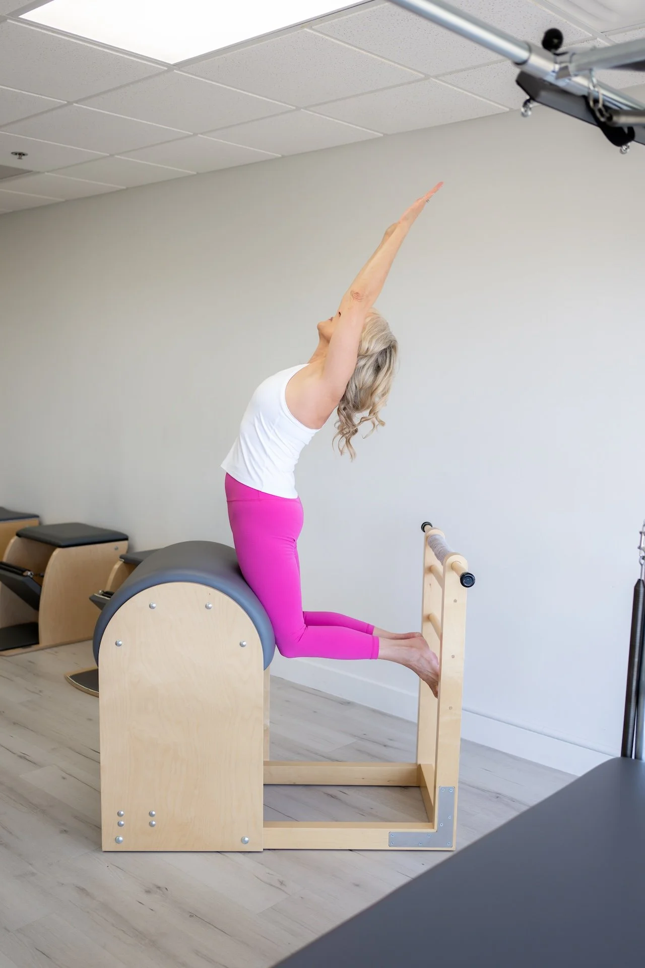 Pilates ladder barrel used for spinal mobility and controlled extension exercises