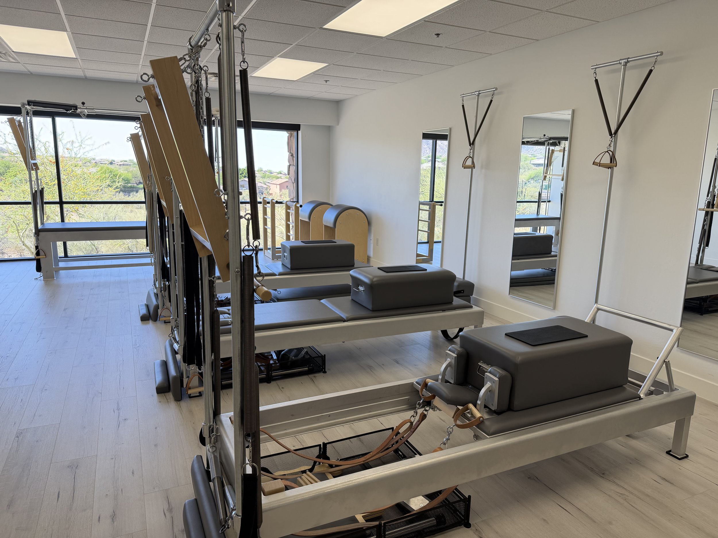 Traditional Pilates apparatus setup inside a Scottsdale Pilates studio