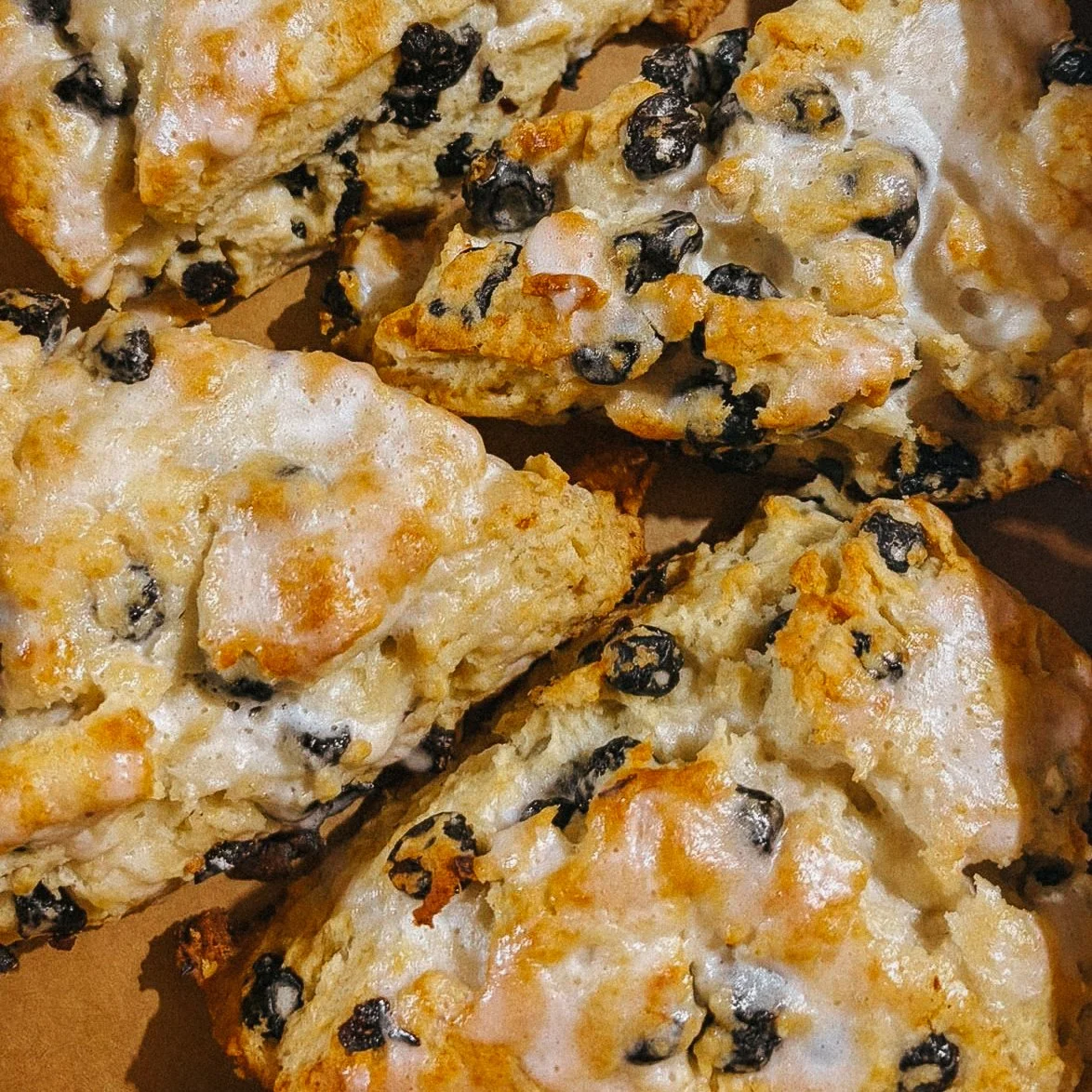 Close-up of no-bake cookies with oats, chocolate chips, coconut, and marshmallows.