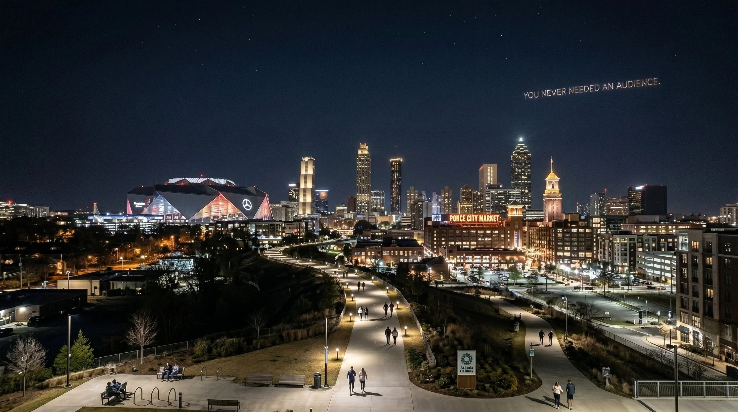 Nighttime city skyline with tall skyscrapers, illuminated buildings, and a modern stadium with a Mercedes-Benz logo. In the foreground, a park with walking paths, benches, and people strolling or sitting. The skyline includes a sign that reads "Ponce City Market" and a skyscraper with a pointed top.