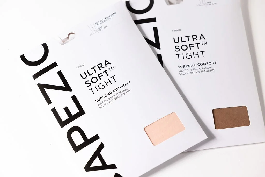 Two boxes of Ultra Soft Tight matte semi-opaque self-knit waistbands with ballet pink and brown swatches in a white setting.