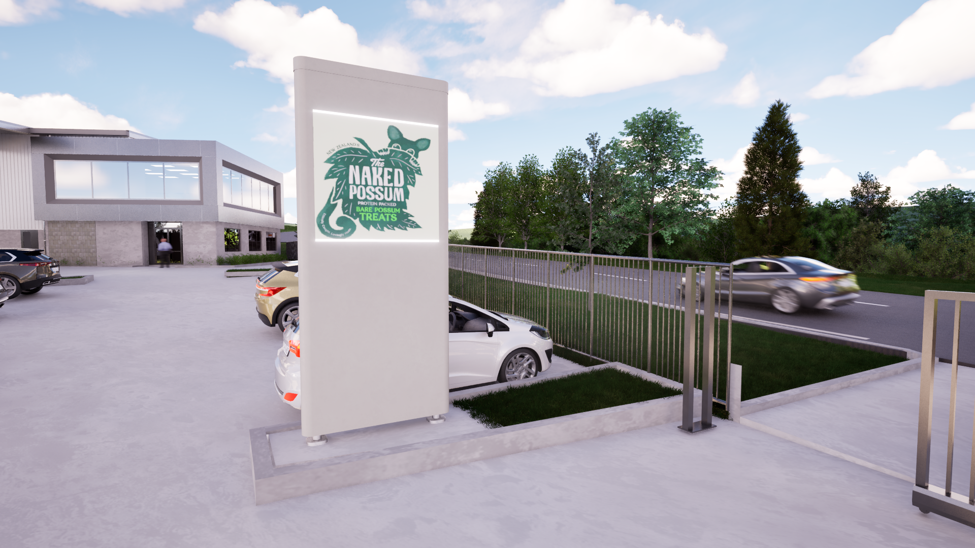 Sign for the Naked Possum, a pet treat shop, near a parking lot with several cars outside a modern building, with trees and a road in the background.