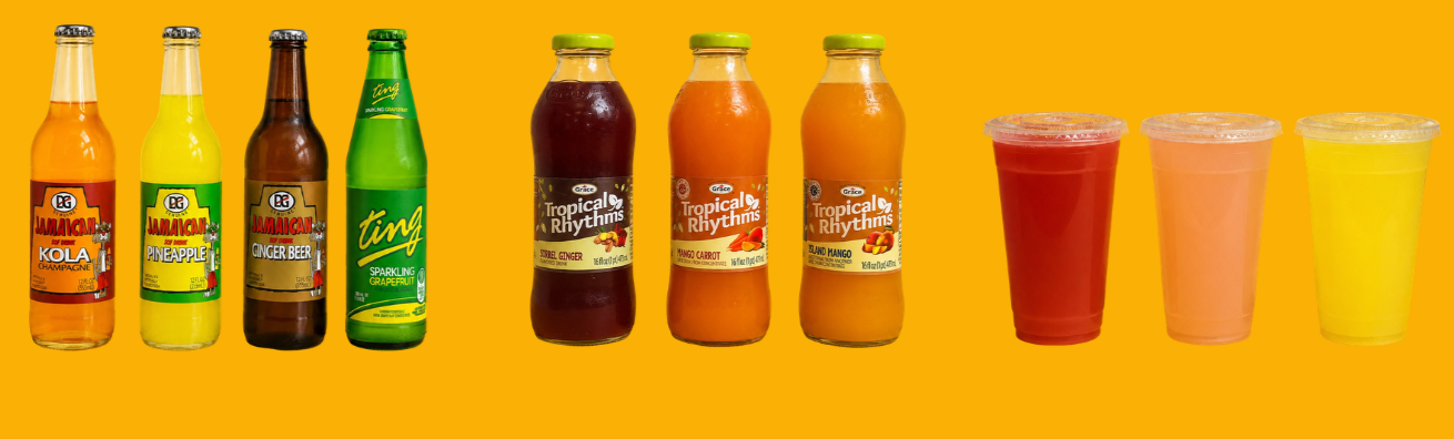 A lineup of eight bottles and cups of tropical fruit beverages against a yellow background, including drinks labeled Jamaican Kola, Jamaican Pineapple, Ginger Beer, Sparkling Grapefruit, Tropical Rhythms Street Ginger, Mango Carrot, and three fruit smoothies in red, pink, and yellow.