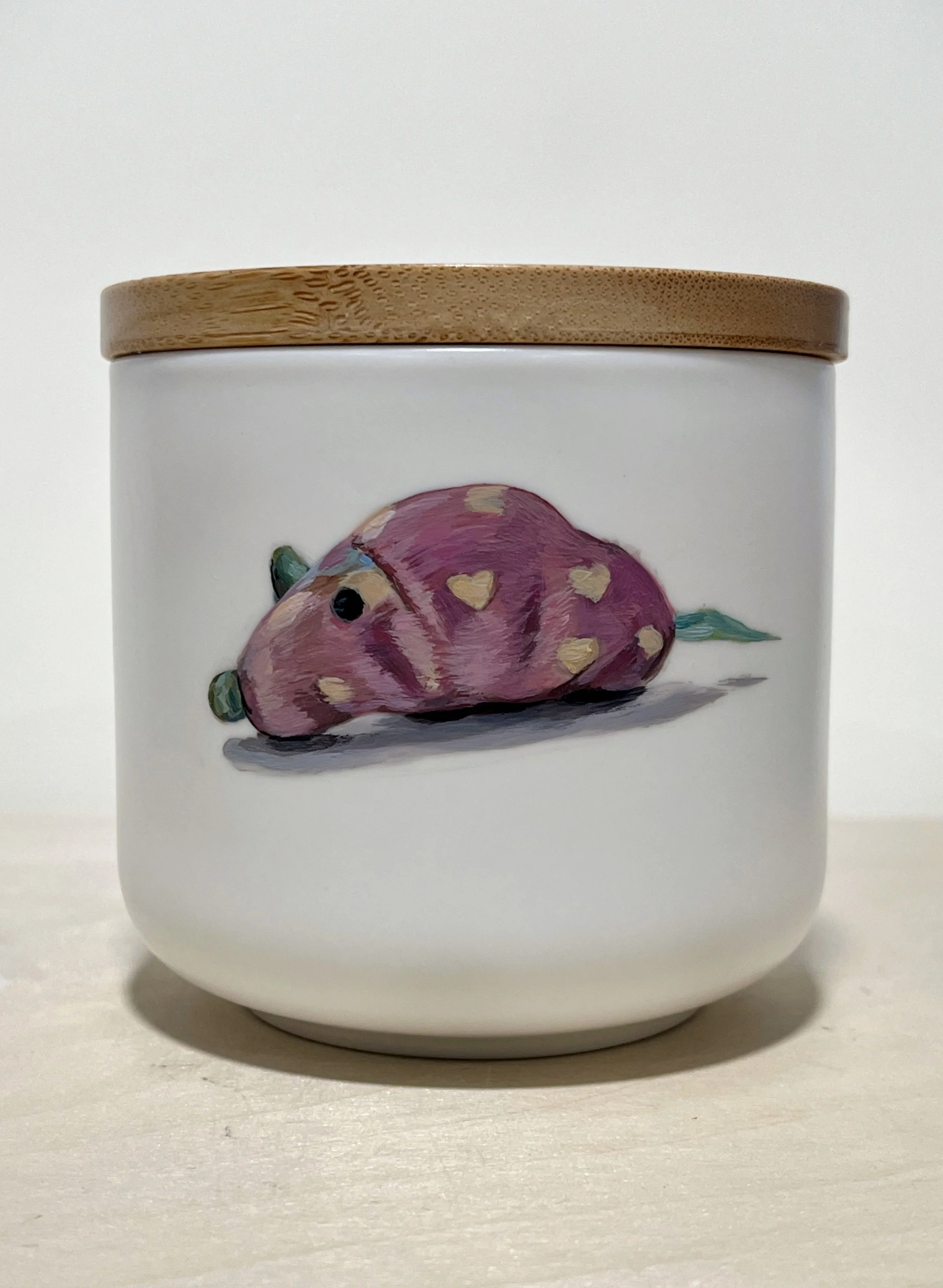 hand painted pet toy on the reverse of the pet portrait urn white ceramic jar with wood lid