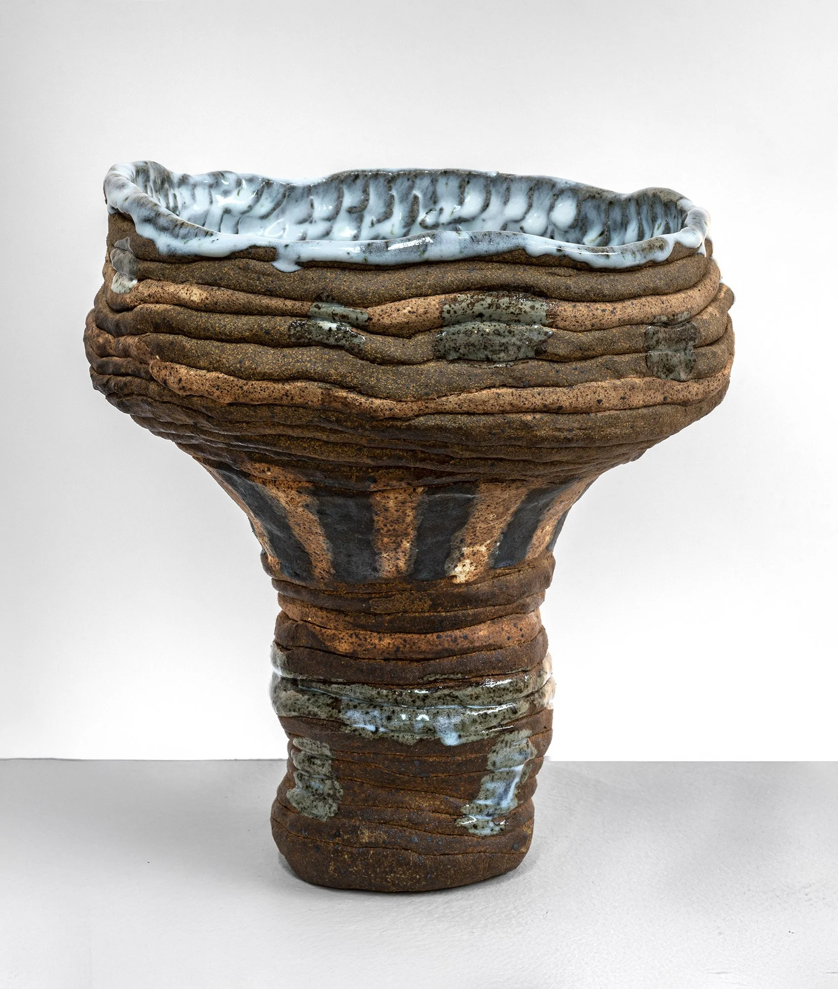 Her Rings Remember Growing
Stoneware, underglazes, glazes
11.5 x 11 x 4.5 in