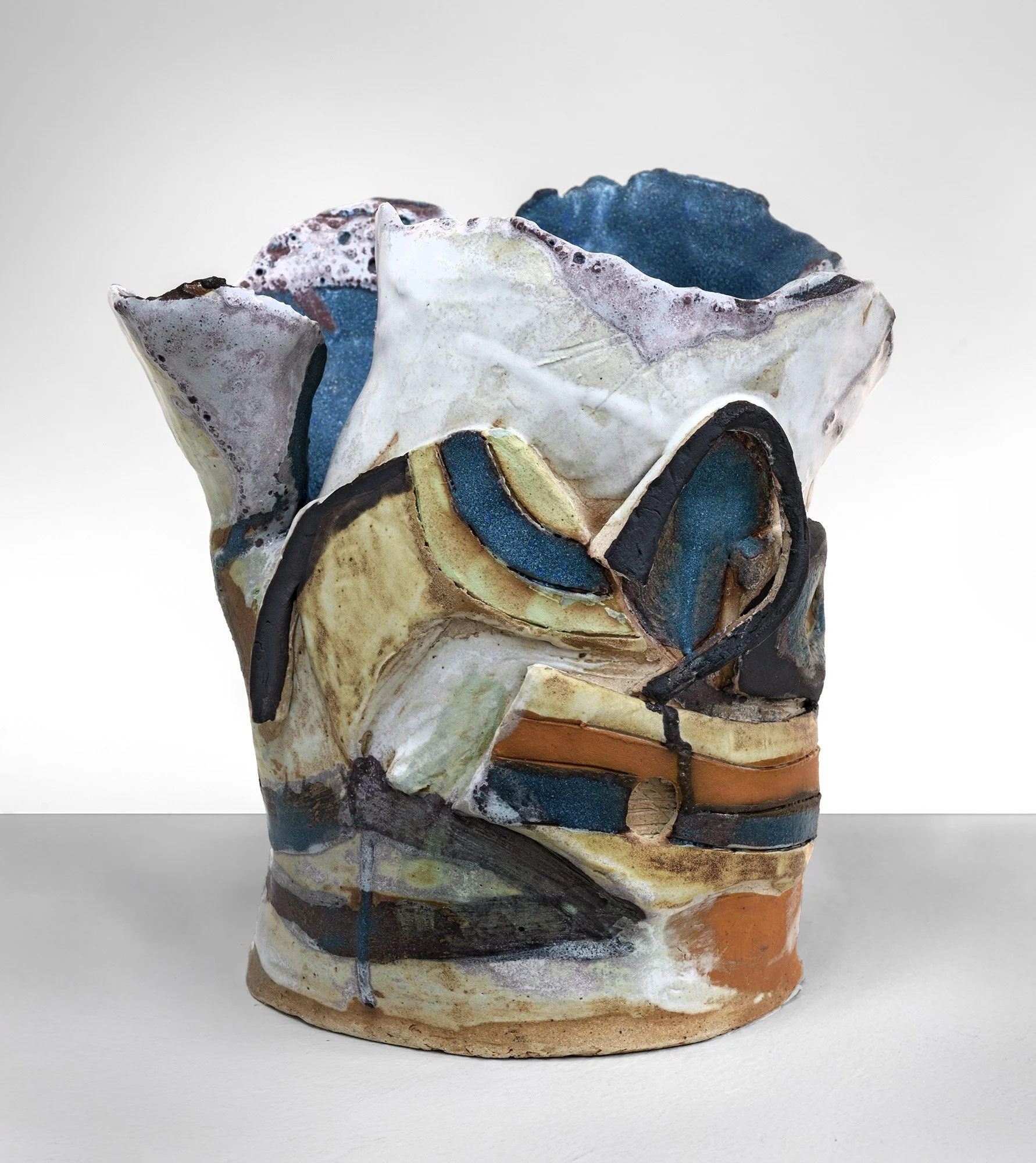 Her Petals Hold the Sea
Stoneware, underglazes, glazes
9 x 8.5 x 5.5 in