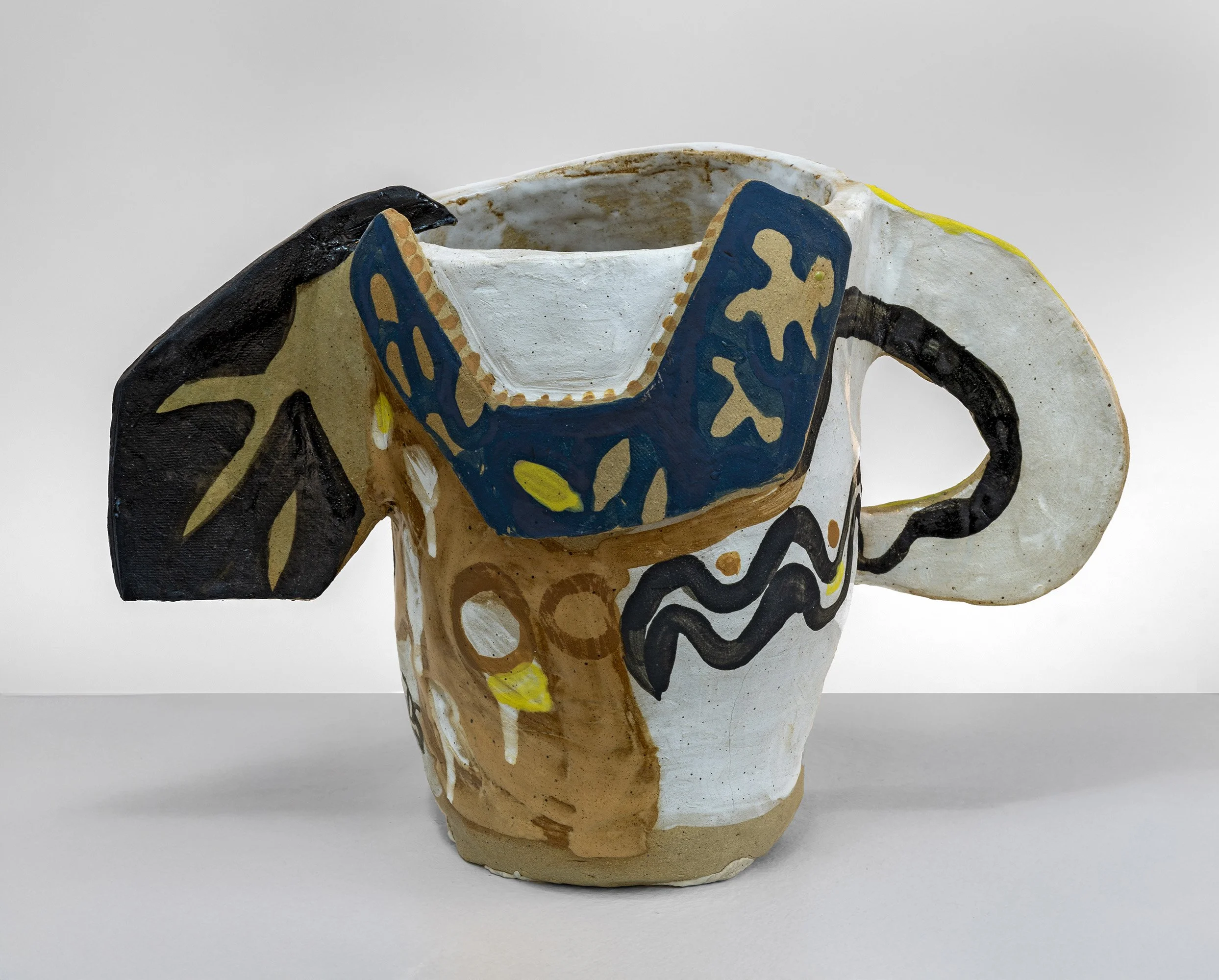 She Carries the Sun in Her Curves
Stoneware, slips, underglazes, glazes
8.5 x 13.5 x 4.5 in