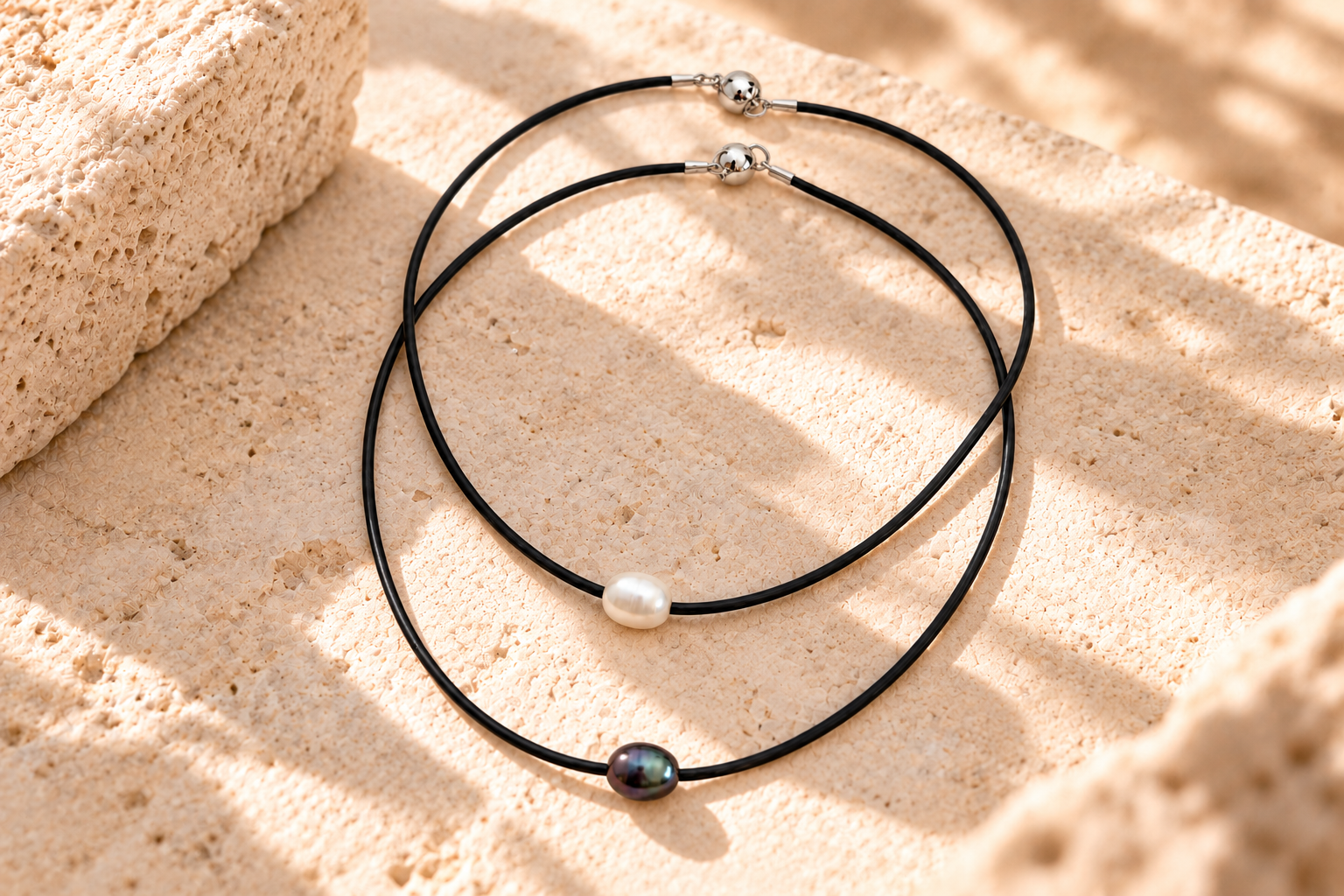 Dolce Rosa jewelry on warm stone (1).png