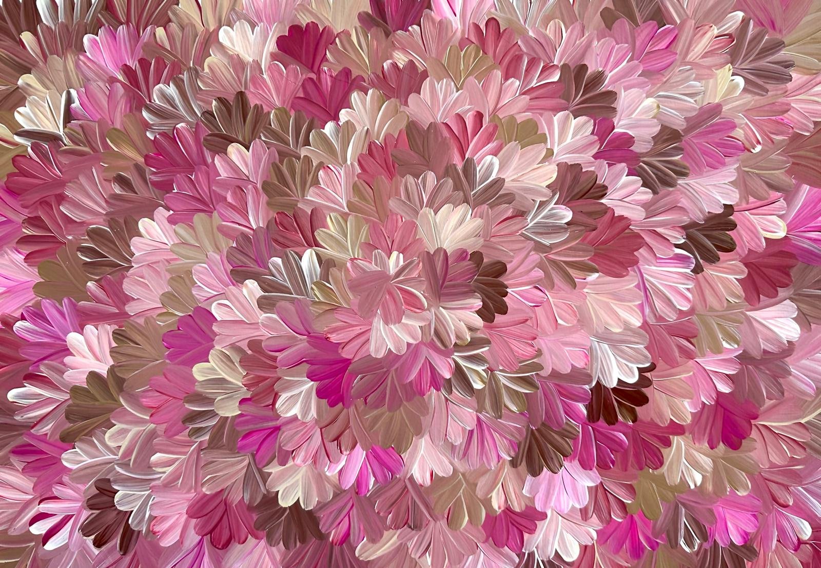 Close-up image of many multicolored flower petals in pink, white, and brown shades.
