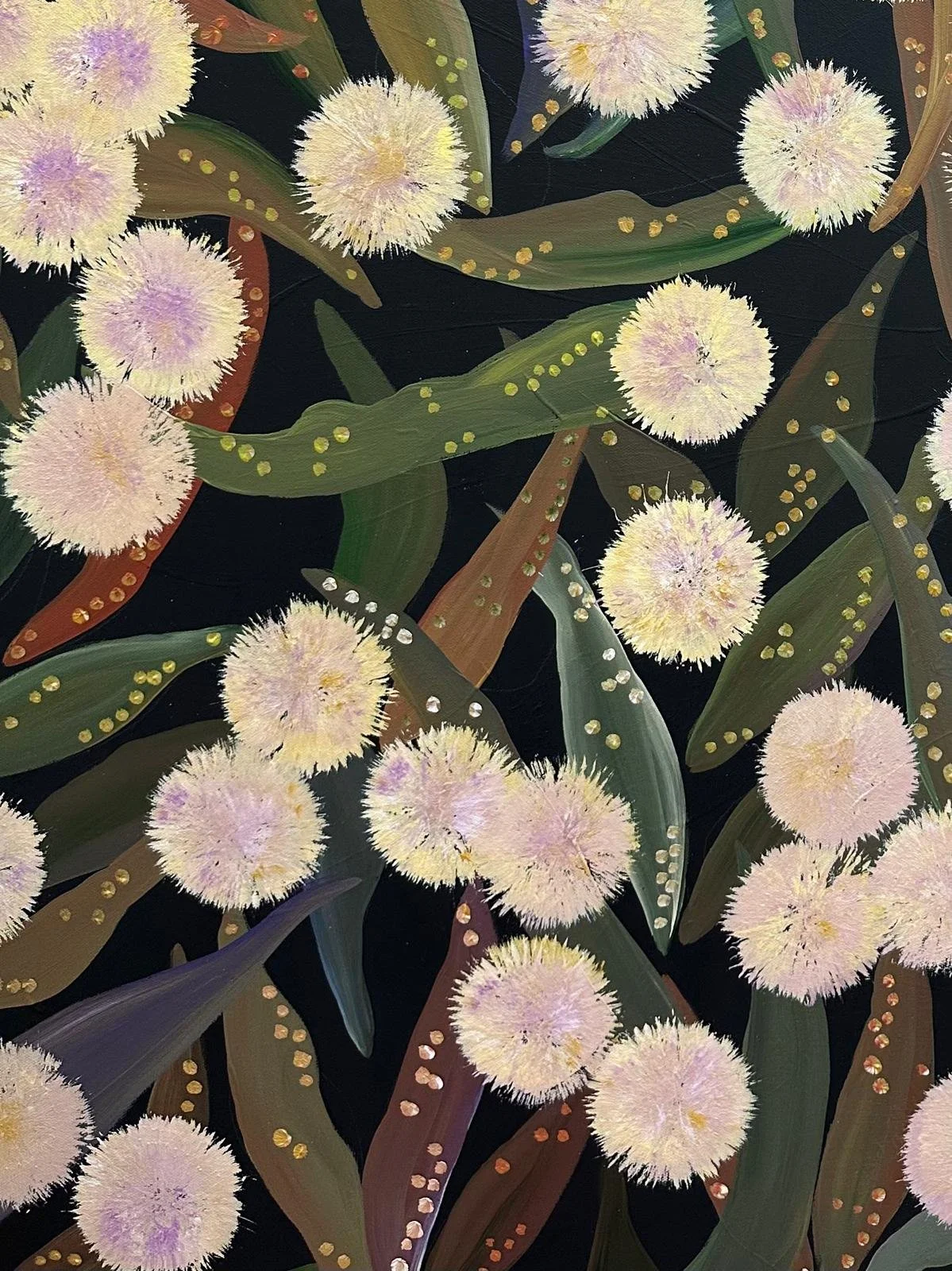 Abstract painting of white, fluffy, spherical flowers with lavender and yellow accents, surrounded by green, brown, and purple leaves with gold dots on a black background.