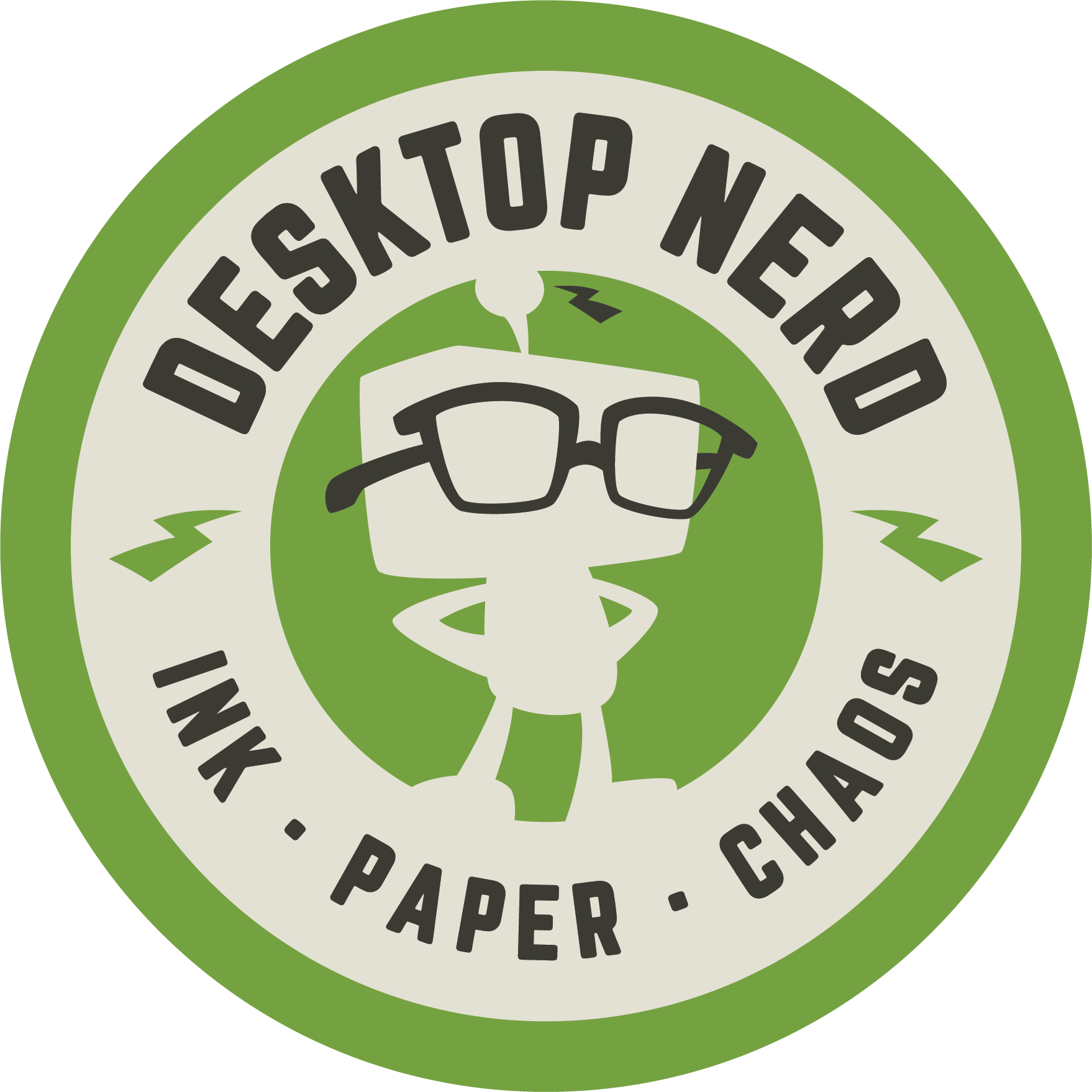 Circular logo with green and off-white colors that says 'Desktop Nerd' and 'Paper - Cardboard - Shredded' around a central graphic of a paper bag wearing glasses.