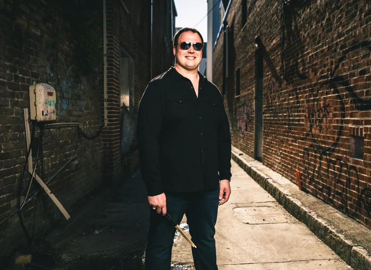 Marc Neary with drumsticks