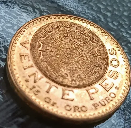 Moneda Azteca de 20 pesos oro disponible para compra y venta en una casa de cambio especializada.