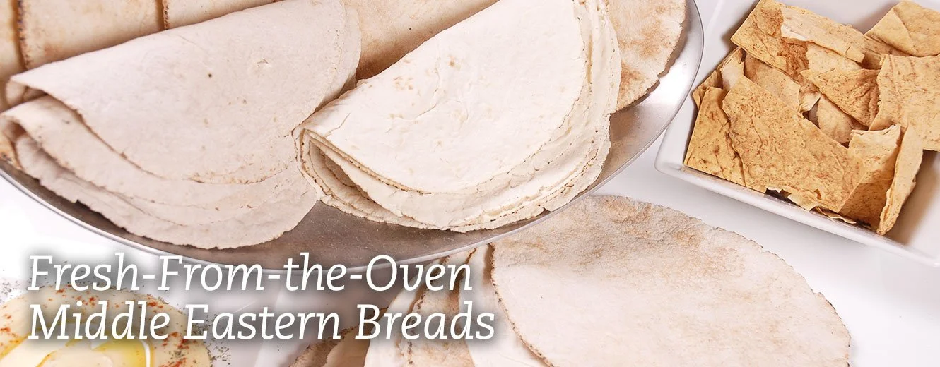 Assorted Middle Eastern breads including pita, flatbread, and broken flatbread on plates with text overlay.