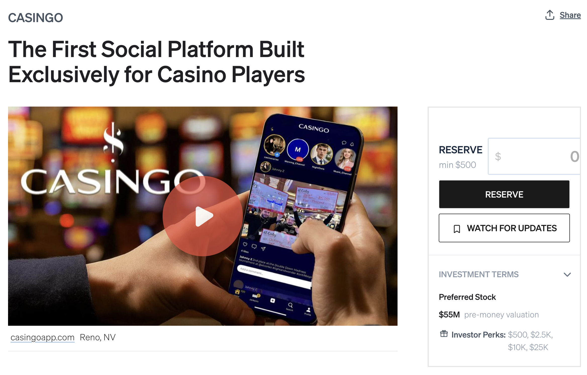 A person holding a smartphone captures a photo of a display with a screen showing a social media post about a casino event in a casino environment with bright lights and slot machines in the background.