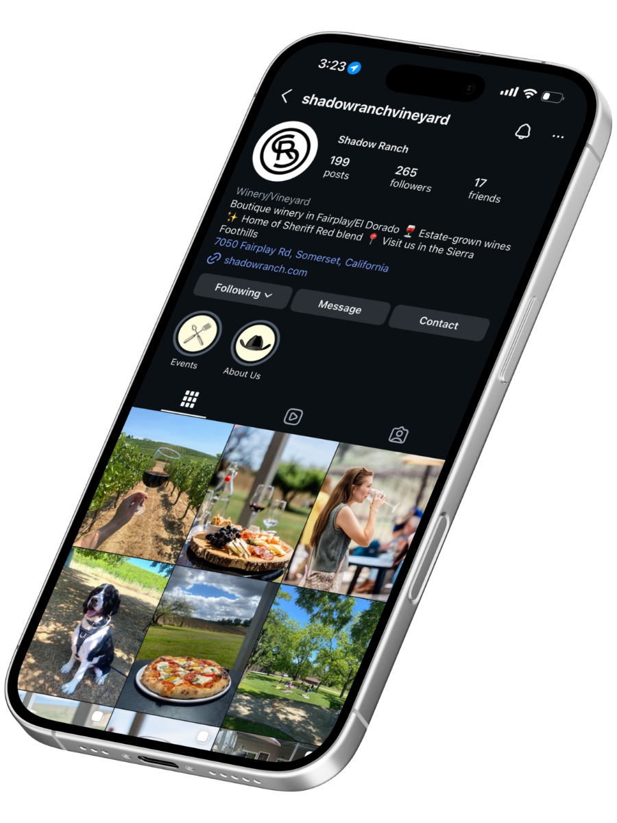 Smartphone displaying the Instagram profile page of shadowranchvineyard, a winery in California, with photos of wine tasting, food, a dog, a pizza, and outdoor scenery.