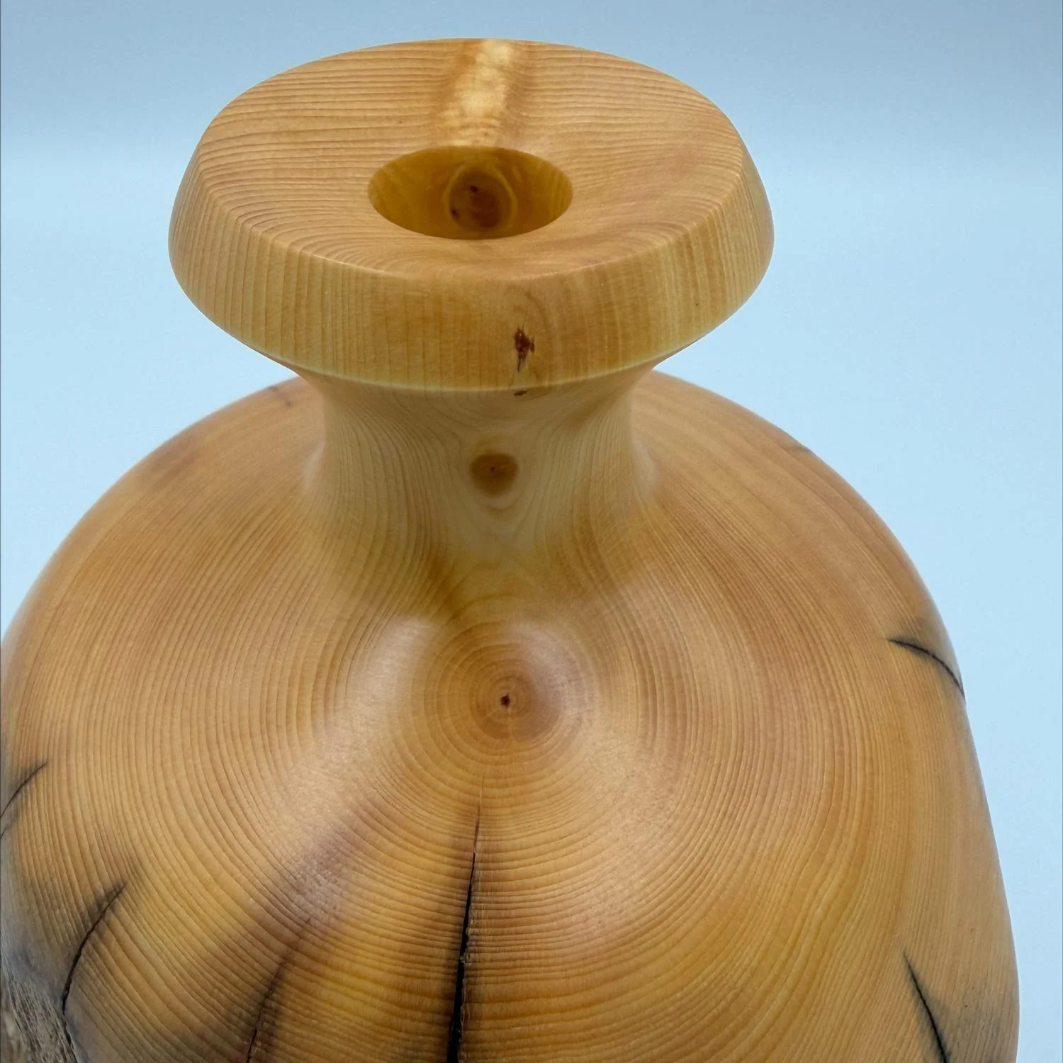 Large Bud Vase in Huon Pine Limb Wood with close up of trumpet rim, crafted by Andrew McNamara Woodturning, Australian wood turner.