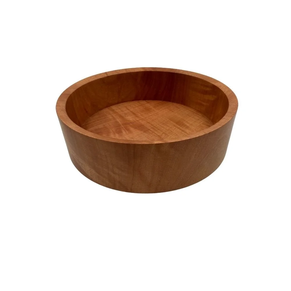Side/above view of medium salad bowl in Red Flowering Gum timber, crafted by Andrew McNamara Woodturning.