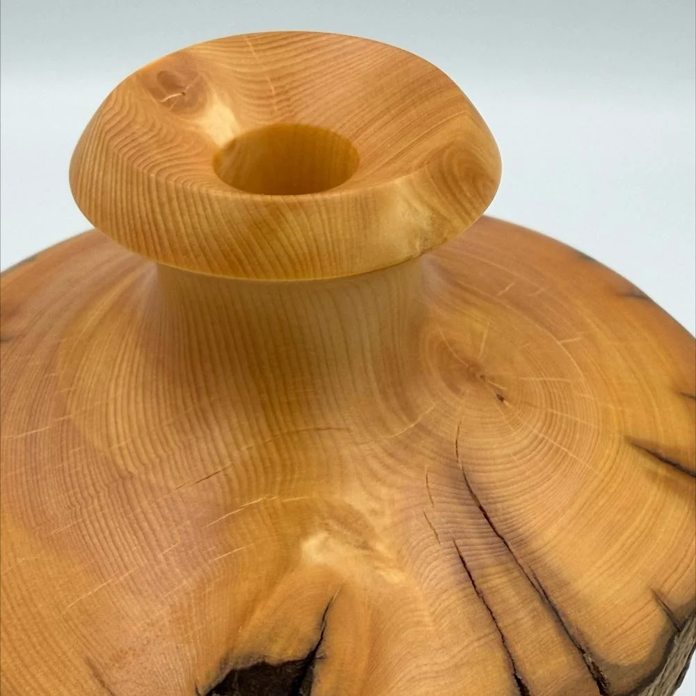 Large Bud Vase in Huon Pine Limb Wood with close up of trumpet rim, crafted by Andrew McNamara Woodturning, Australian wood turner.