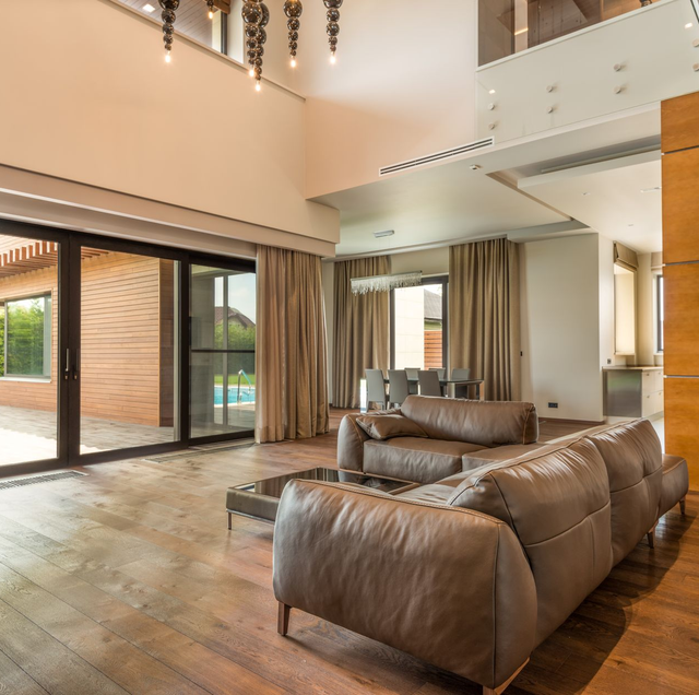 living room chair beside swinging french patio door