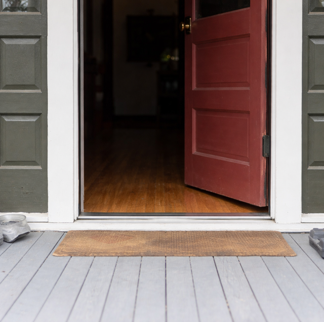 scuffed carpet pile where door bottom edge drags