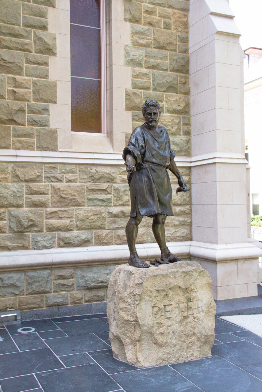 Bronze statue of a St Peter outside St Peter's Toorak church.