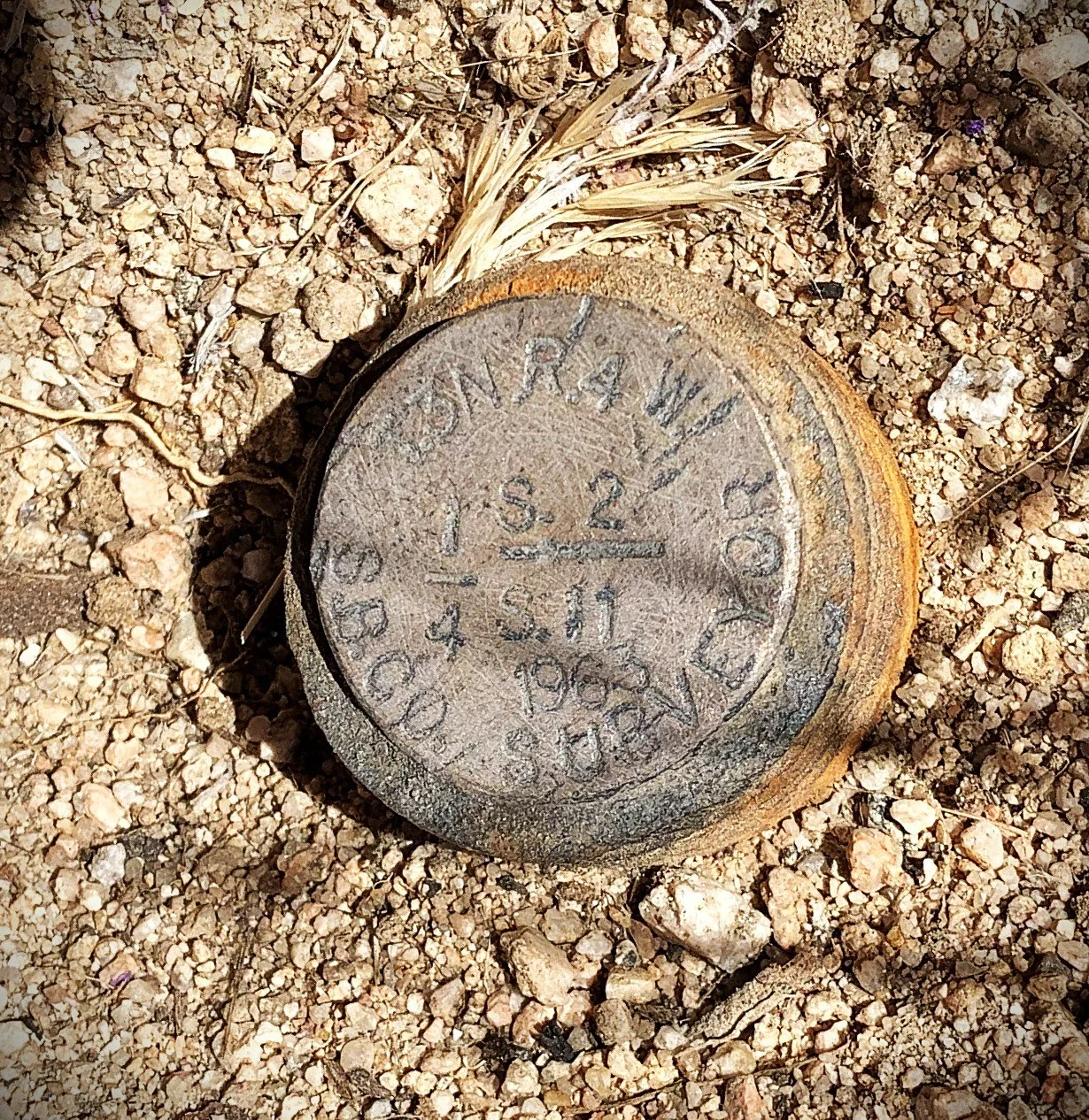 Public lands survey monument, brass disk, monument, land survey monument, survey marker