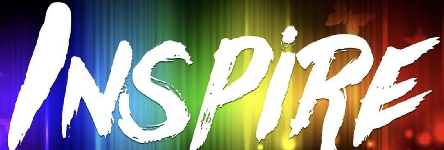 Rainbow-colored background with the word 'INSPIRE' in bold, white, graffiti-style font.