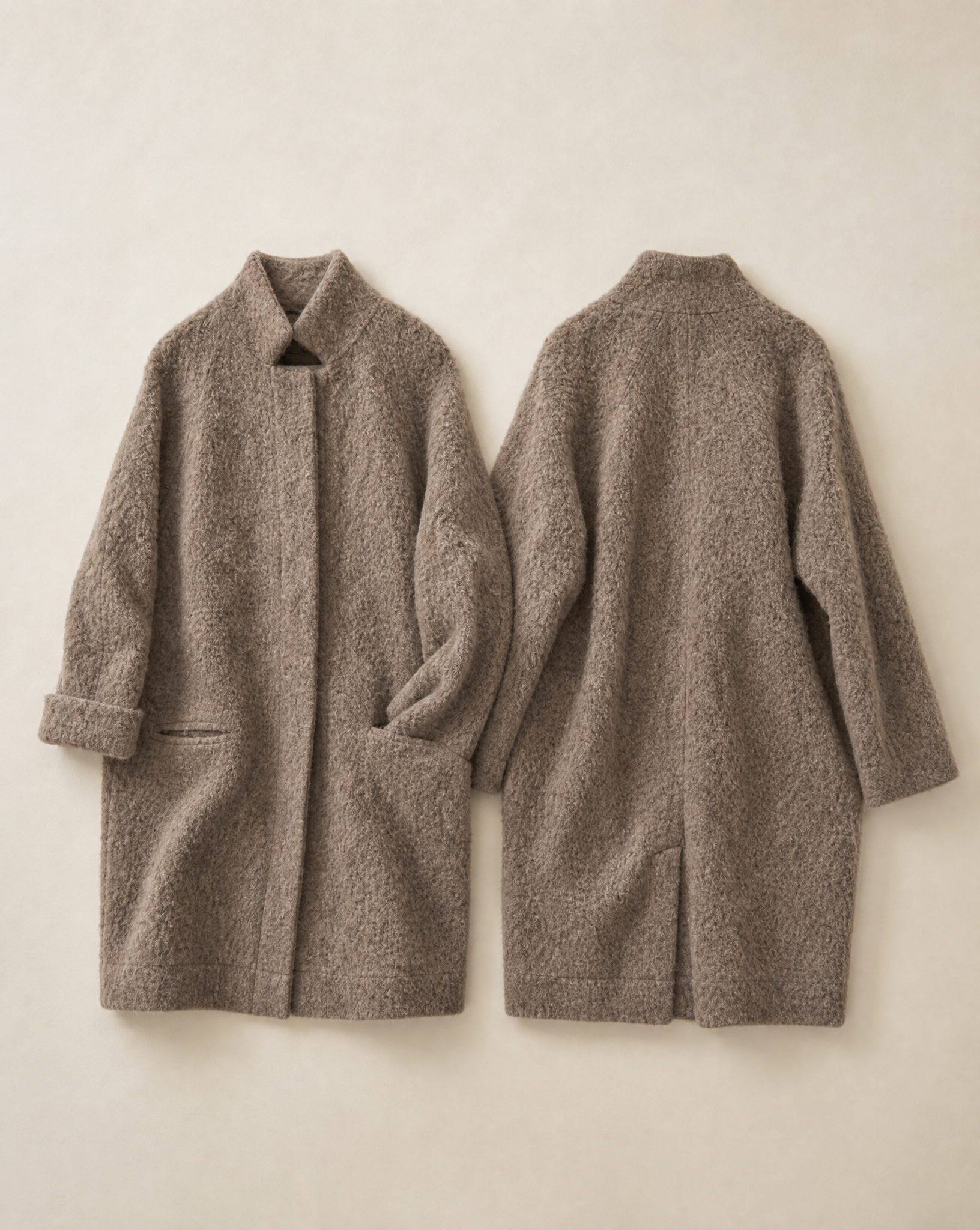 Generated with Kive.ai - s make a flat lay where you can see the coat from front and back.png