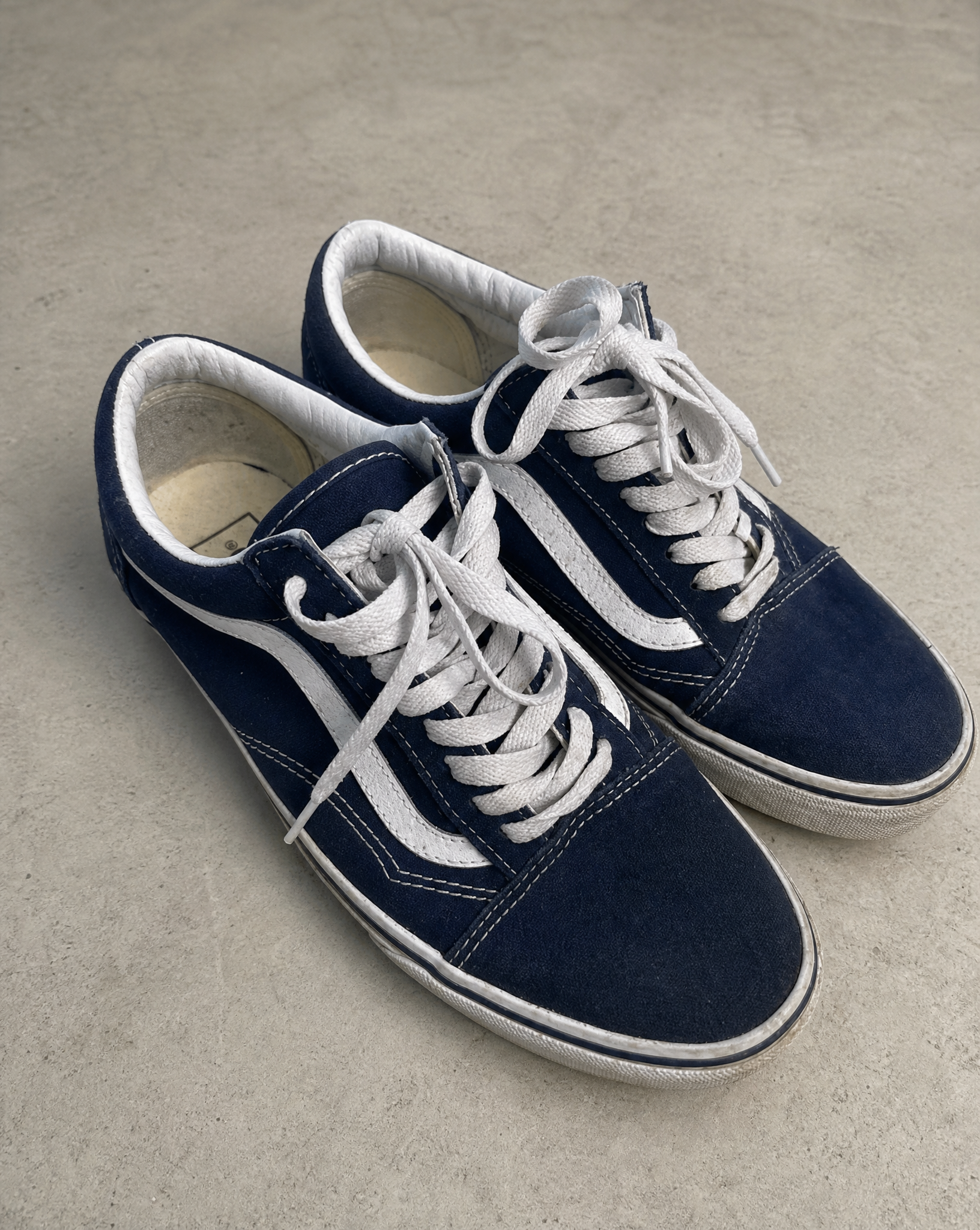 Generated with Kive.ai - Black canvas sneakers Dark blue vans sneakers make a product pic only of shoes not to polished because they are second Hand.png