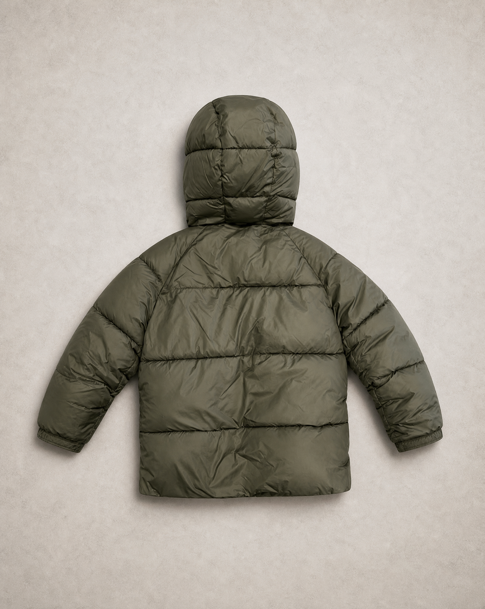 Generated with Kive.ai - Olive puffer jacket Make a flat lay of this back side.png