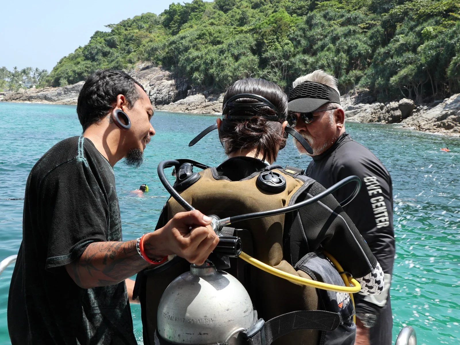GoBuddy dive instructor briefing students before a Phuket dive