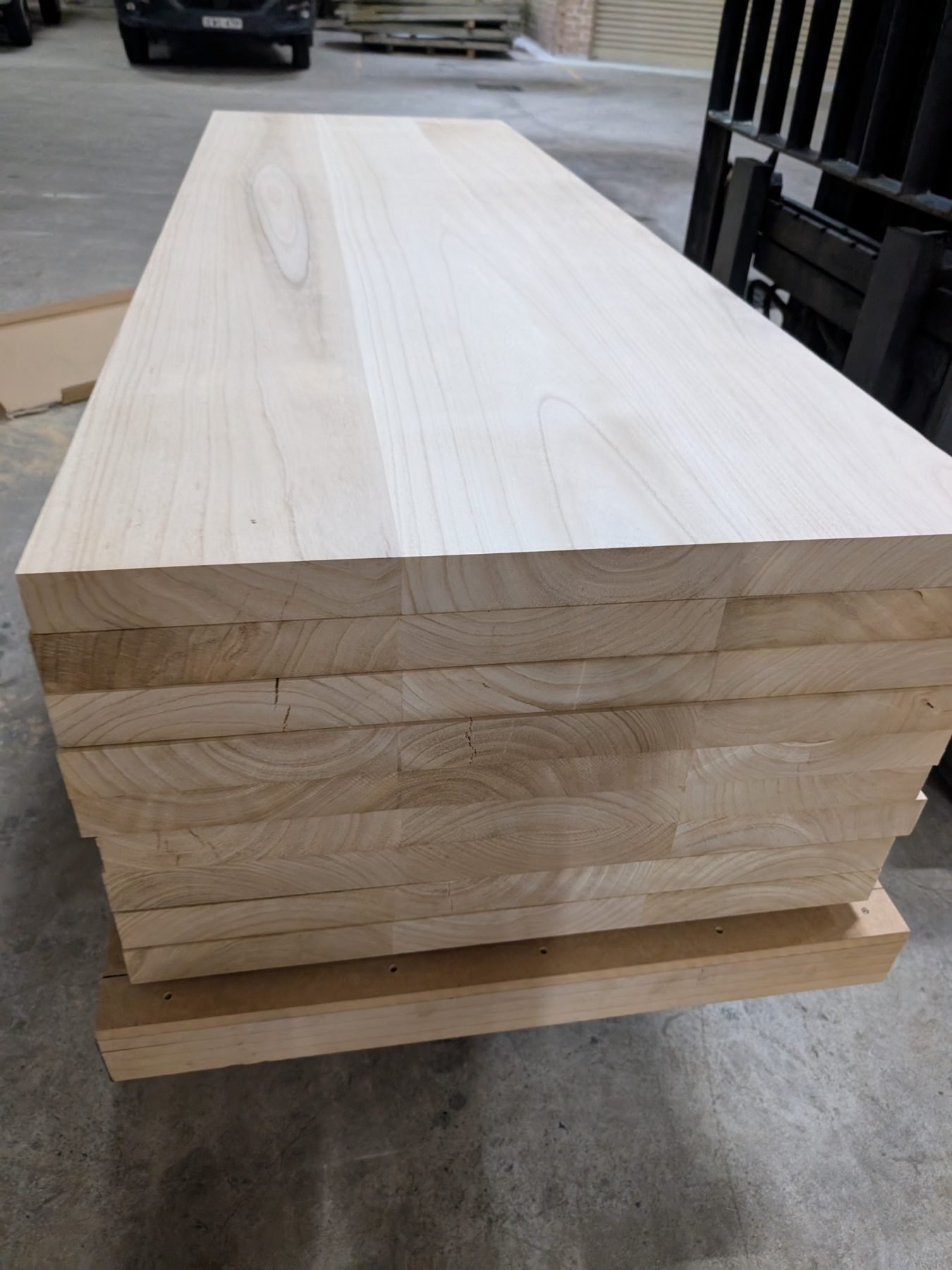 Stack of edge-glued Paulownia panels ready for dispatch