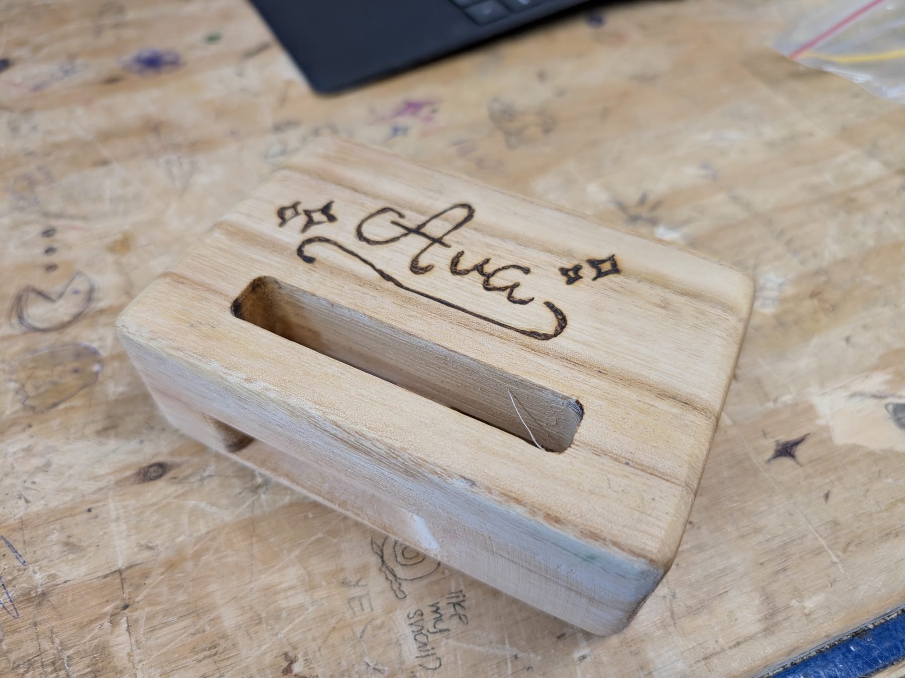 Engraved Paulownia phone stand, a popular school CNC project